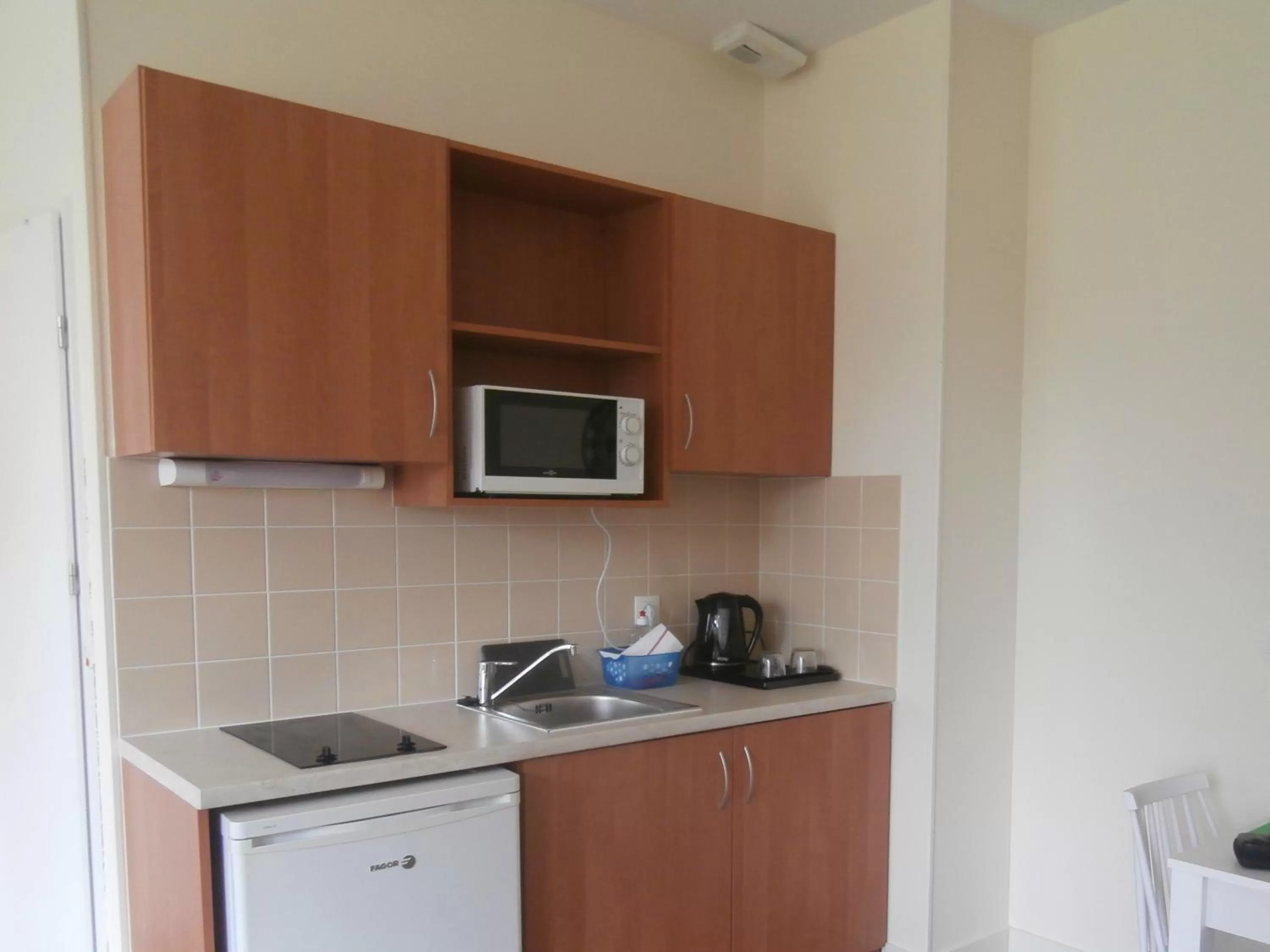 Kitchen or kitchenette in Résidence La Providence ZENAO Lisieux