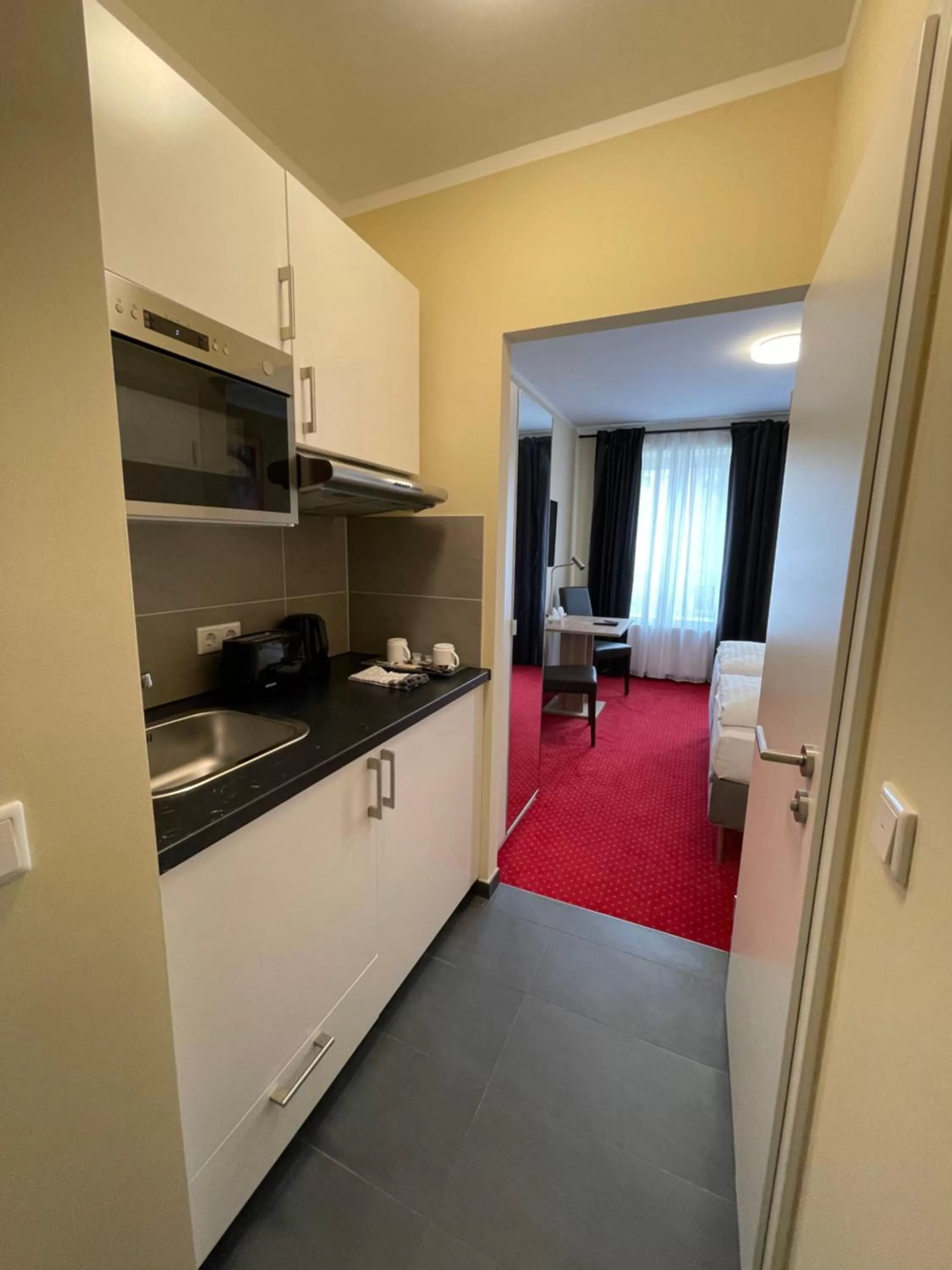 Kitchen or kitchenette in Palm Premium Hotel & Apartments