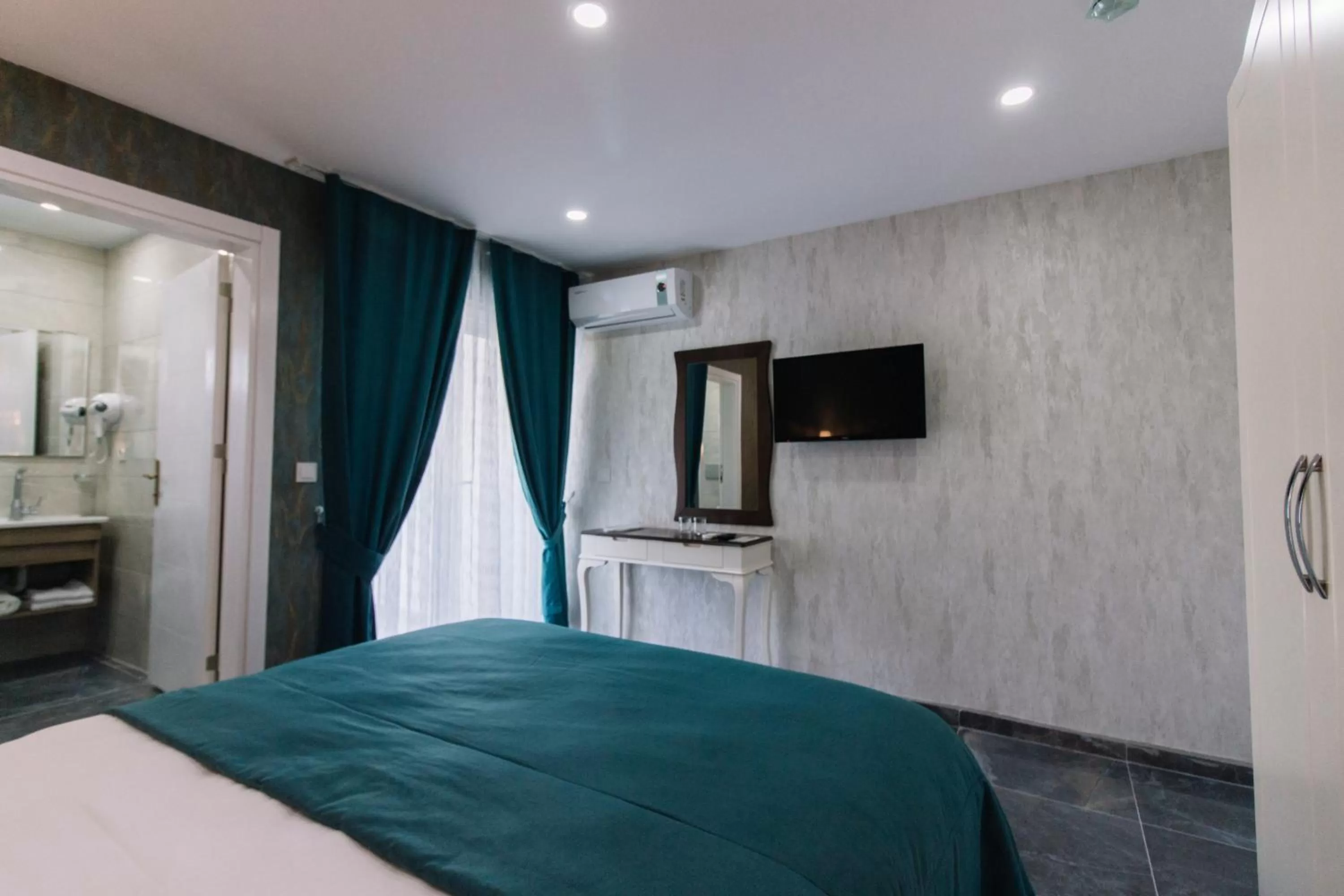 Bed in Melrose Pansiyon