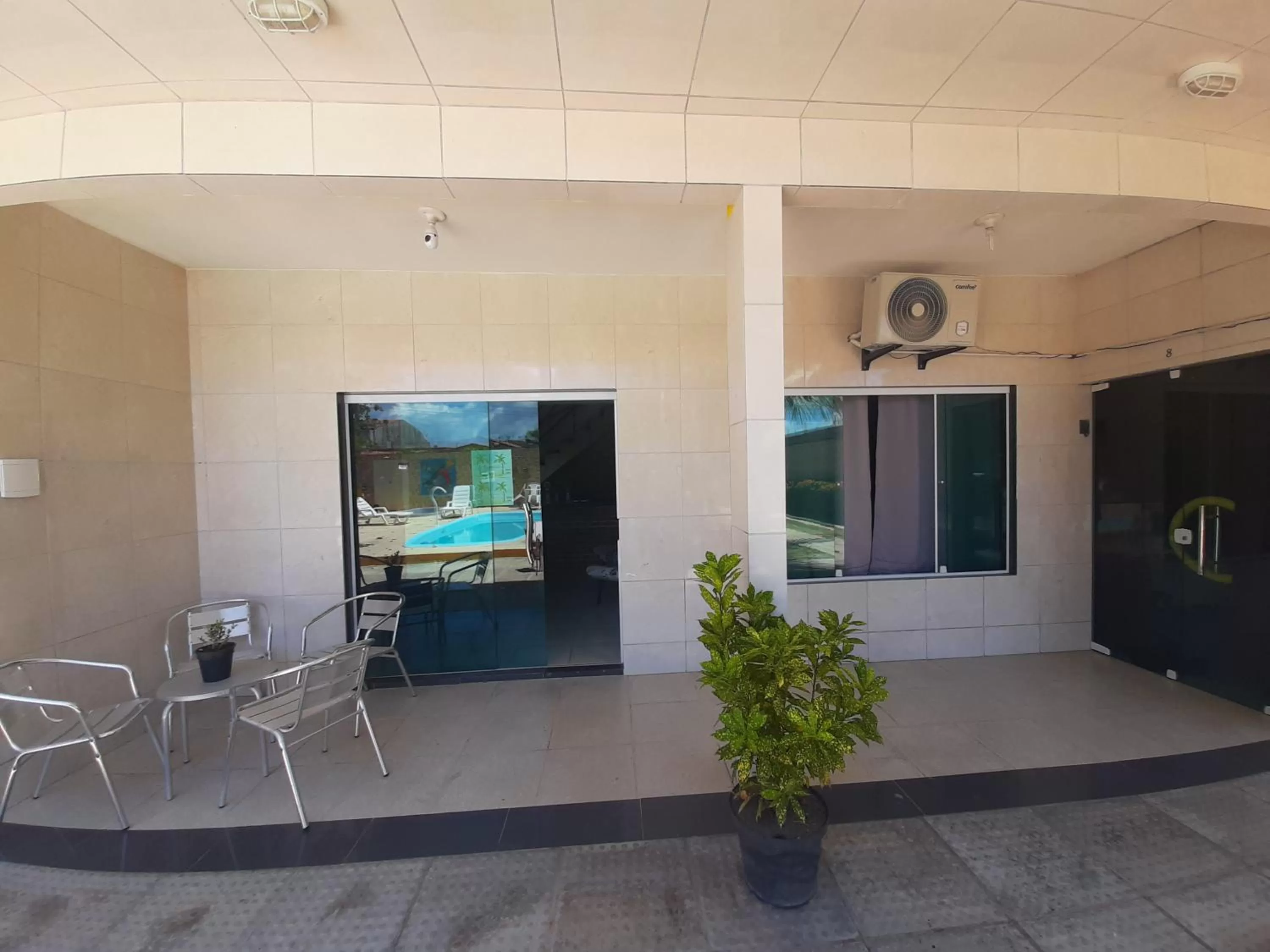 Lobby or reception, TV/Entertainment Center in Pousada Recanto Canaã