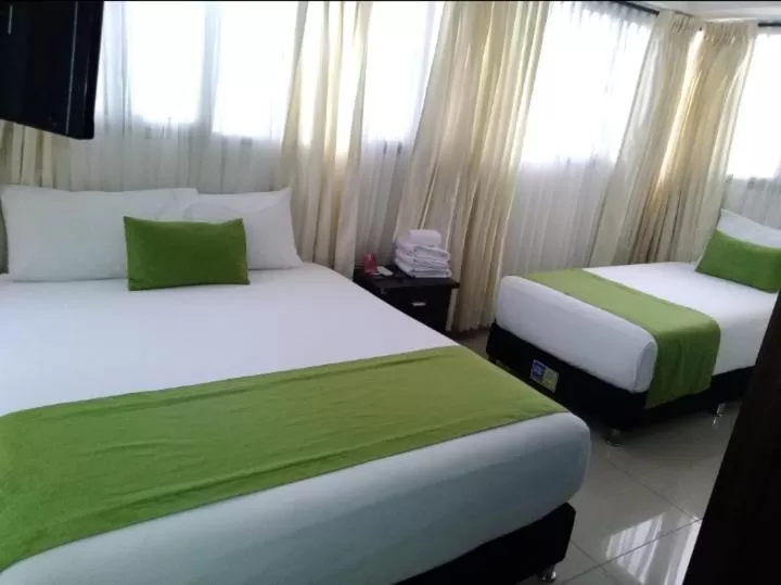 Bedroom, Bed in Hotel Cafe Plaza