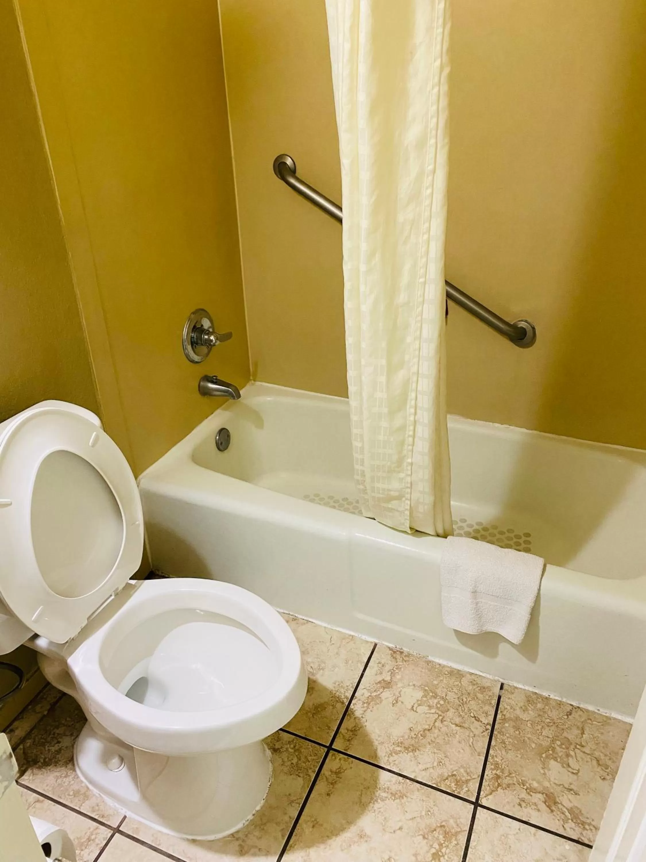 Toilet in Super 8 by Wyndham New Iberia