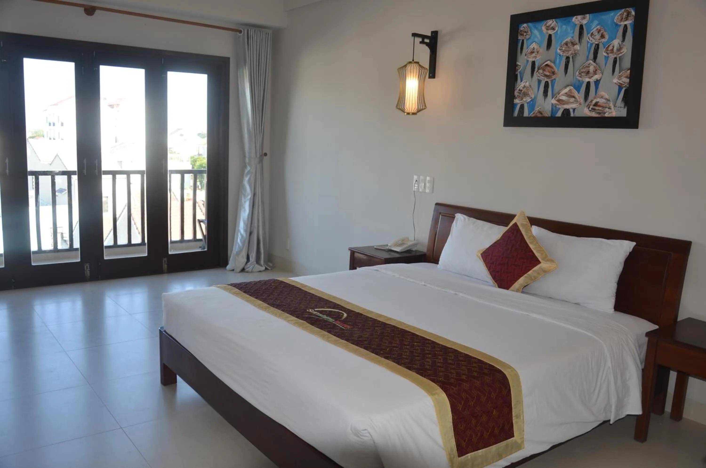 Bed in Sunshine Hoian Hotel