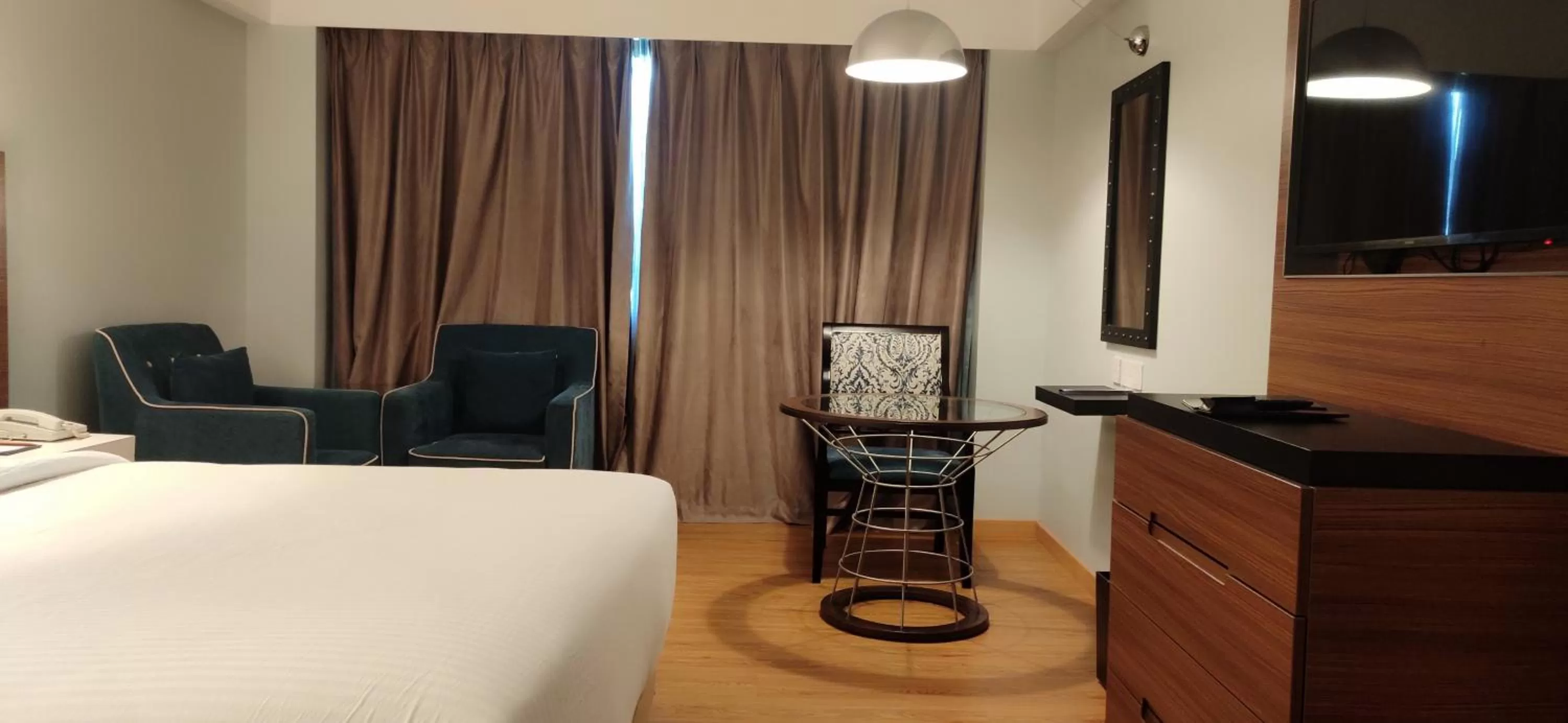 Communal lounge/ TV room, TV/Entertainment Center in Manjeera Sarovar Premiere