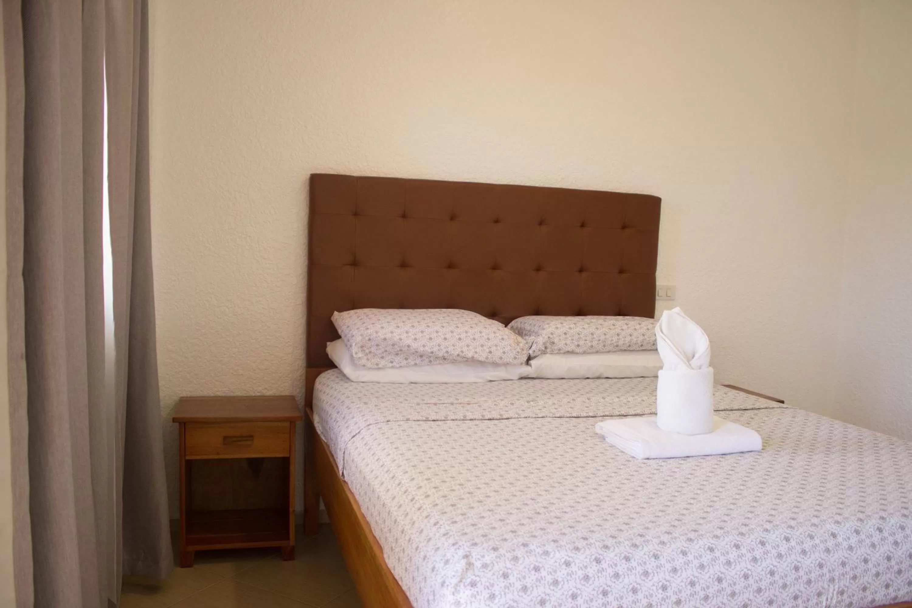 Bed in Jugalis Hotel and Restaurant