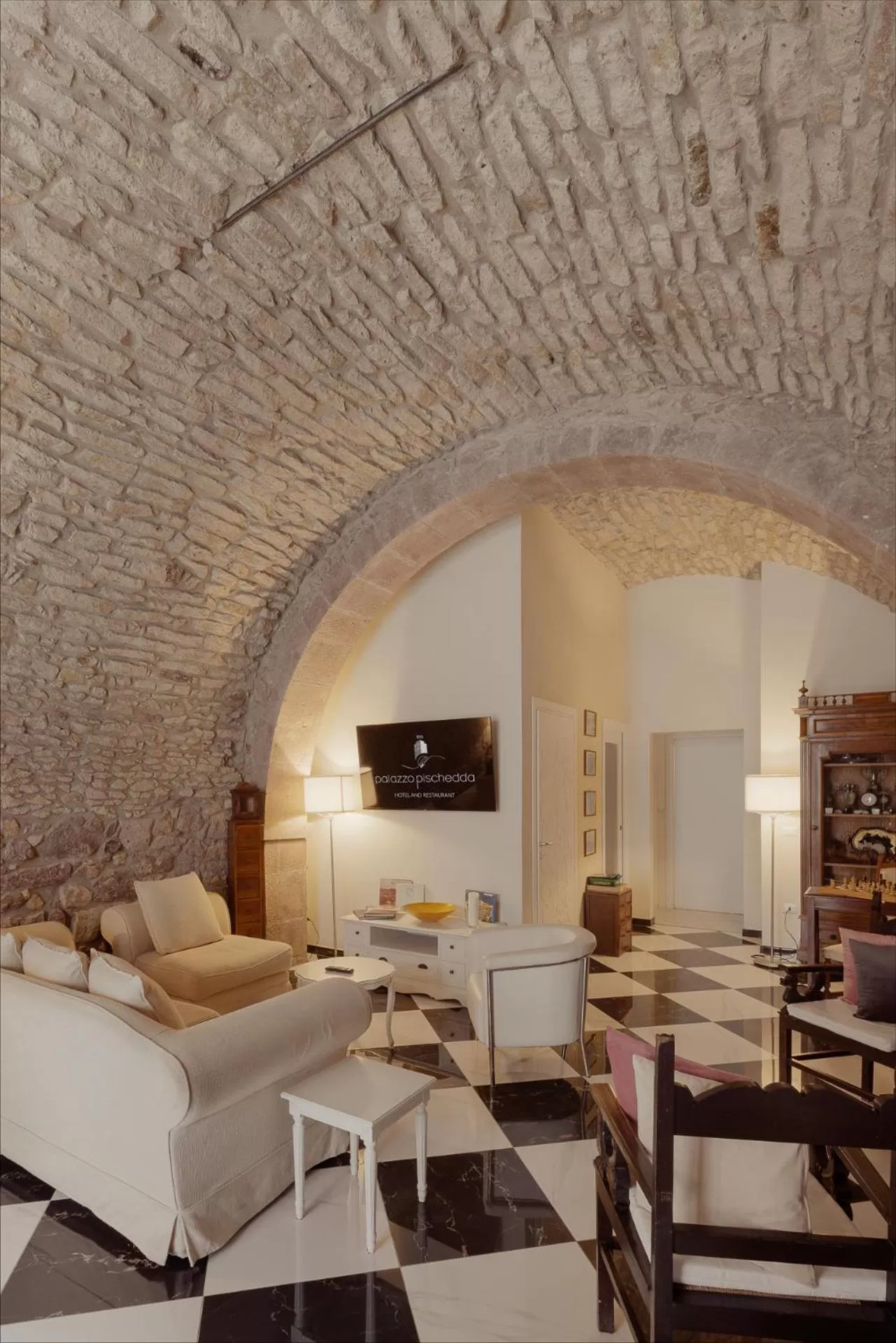 Communal lounge/ TV room in Palazzo Pischedda