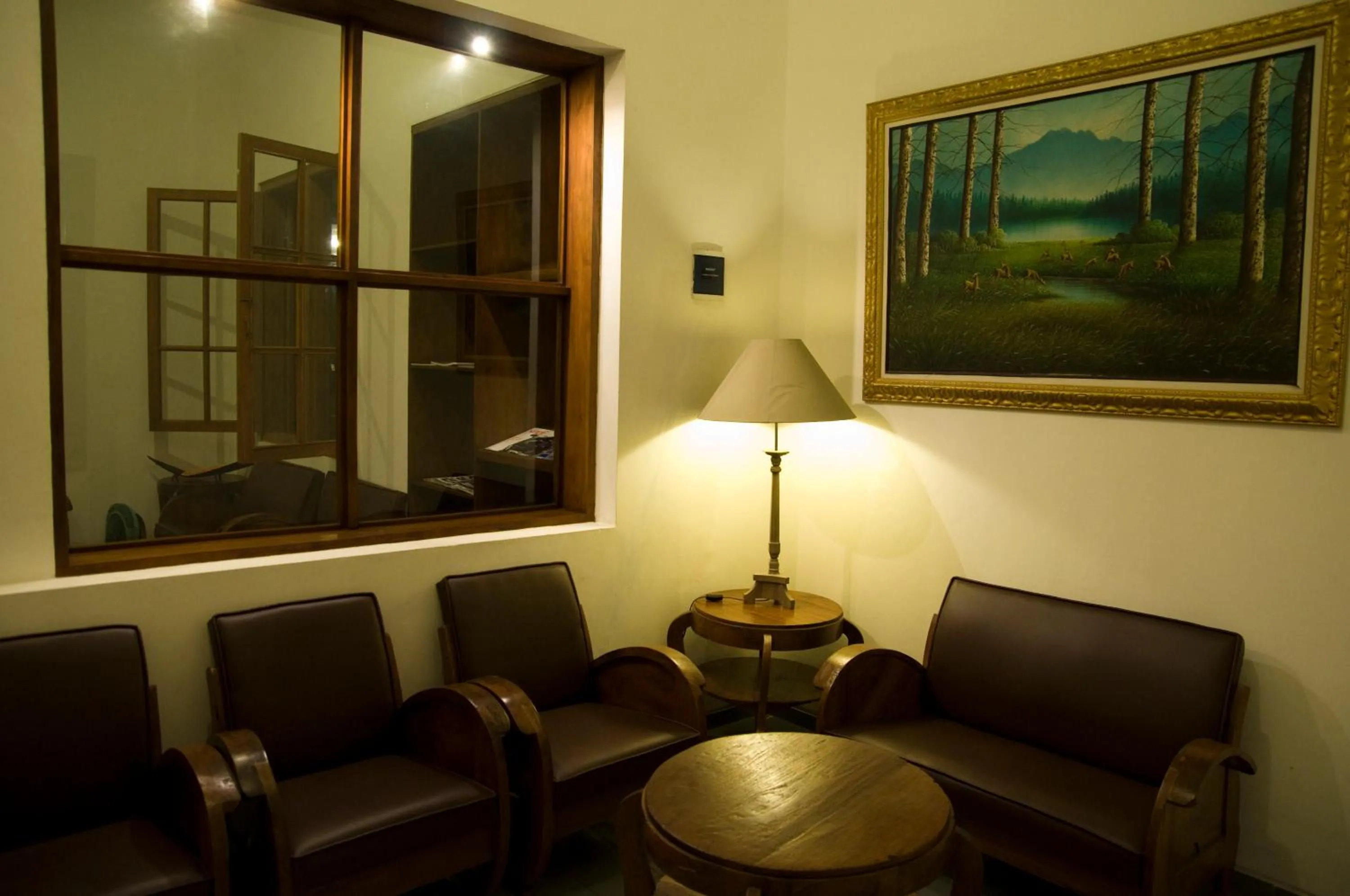 Communal lounge/ TV room in Hotel Graha Kinasih Kotabaru