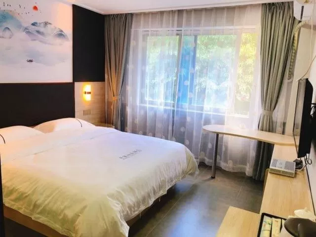 Bed in Shenzhen Hualian Boutique Hotel