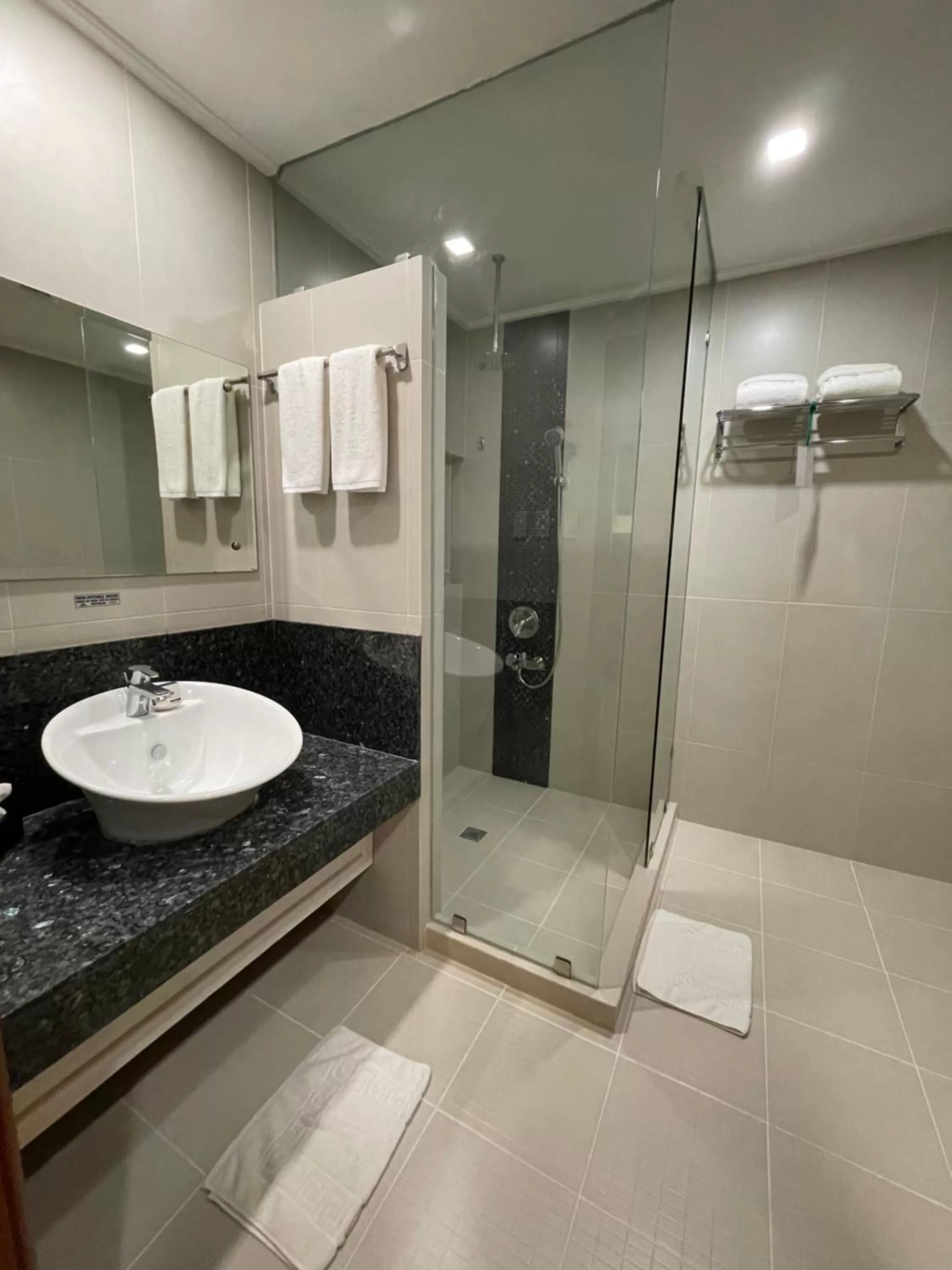 Bathroom in Days Hotel by Wyndham Iloilo