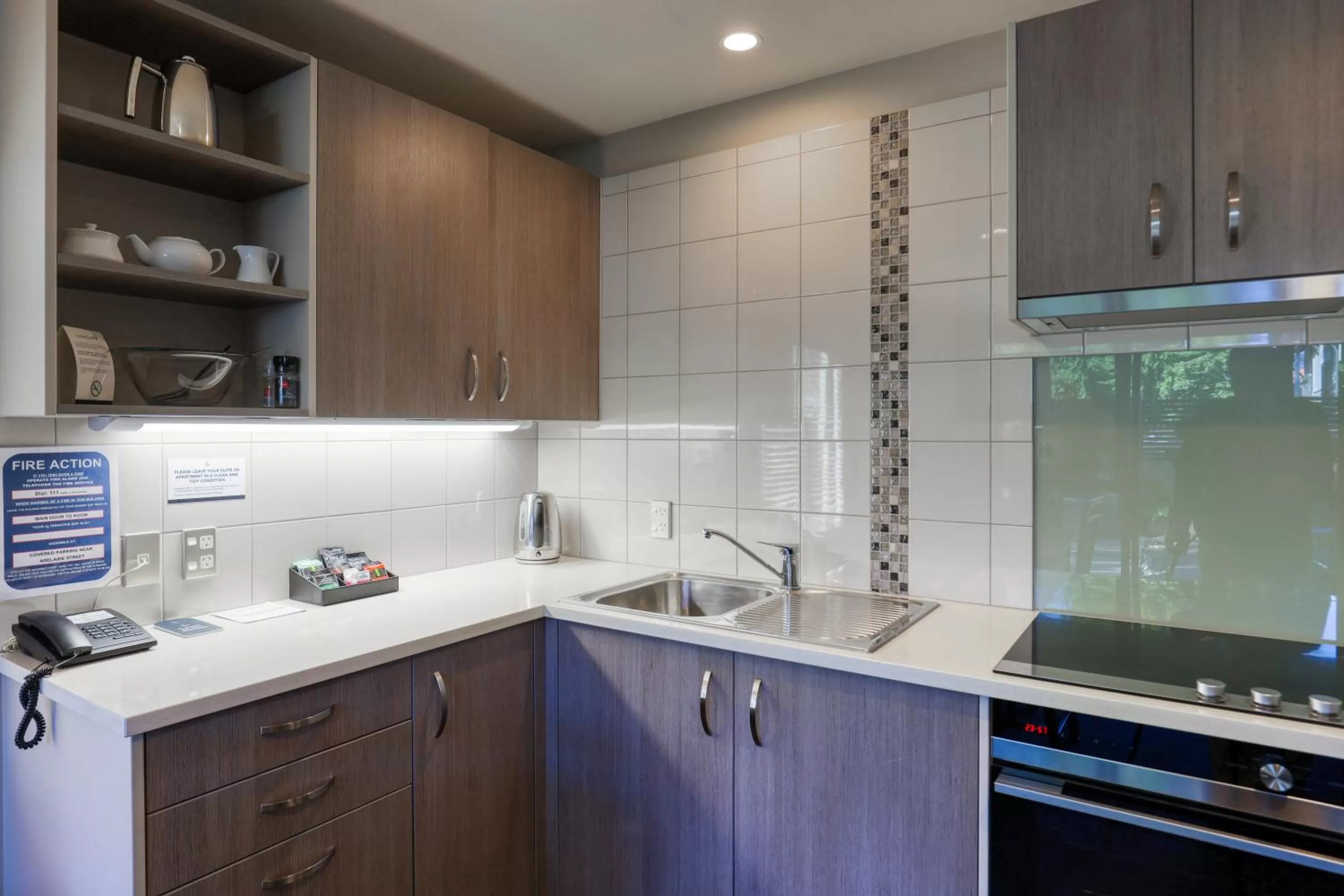 Kitchen or kitchenette in Garden Court Suites & Apartments