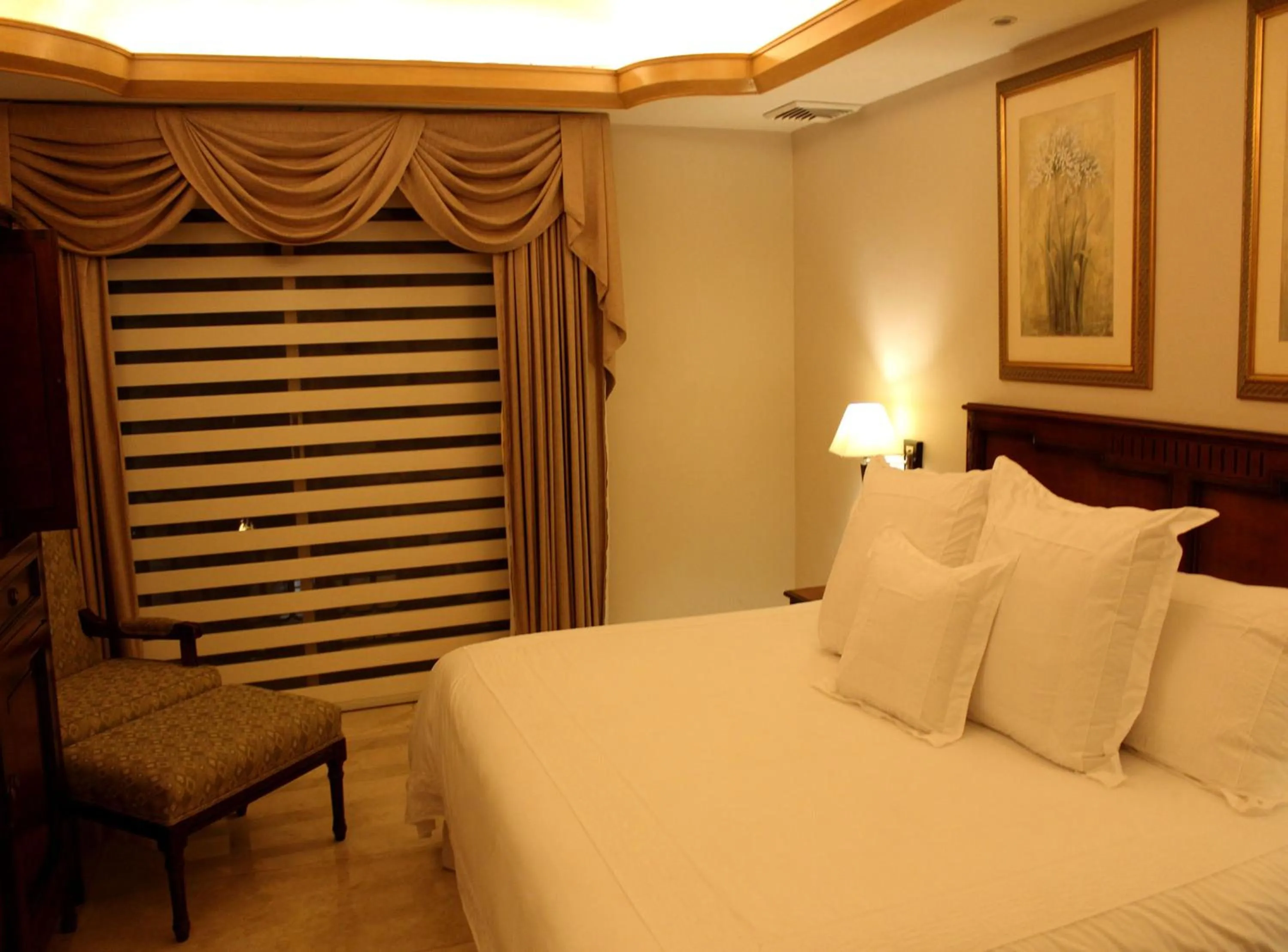 Bed in Hotel Hacienda Real