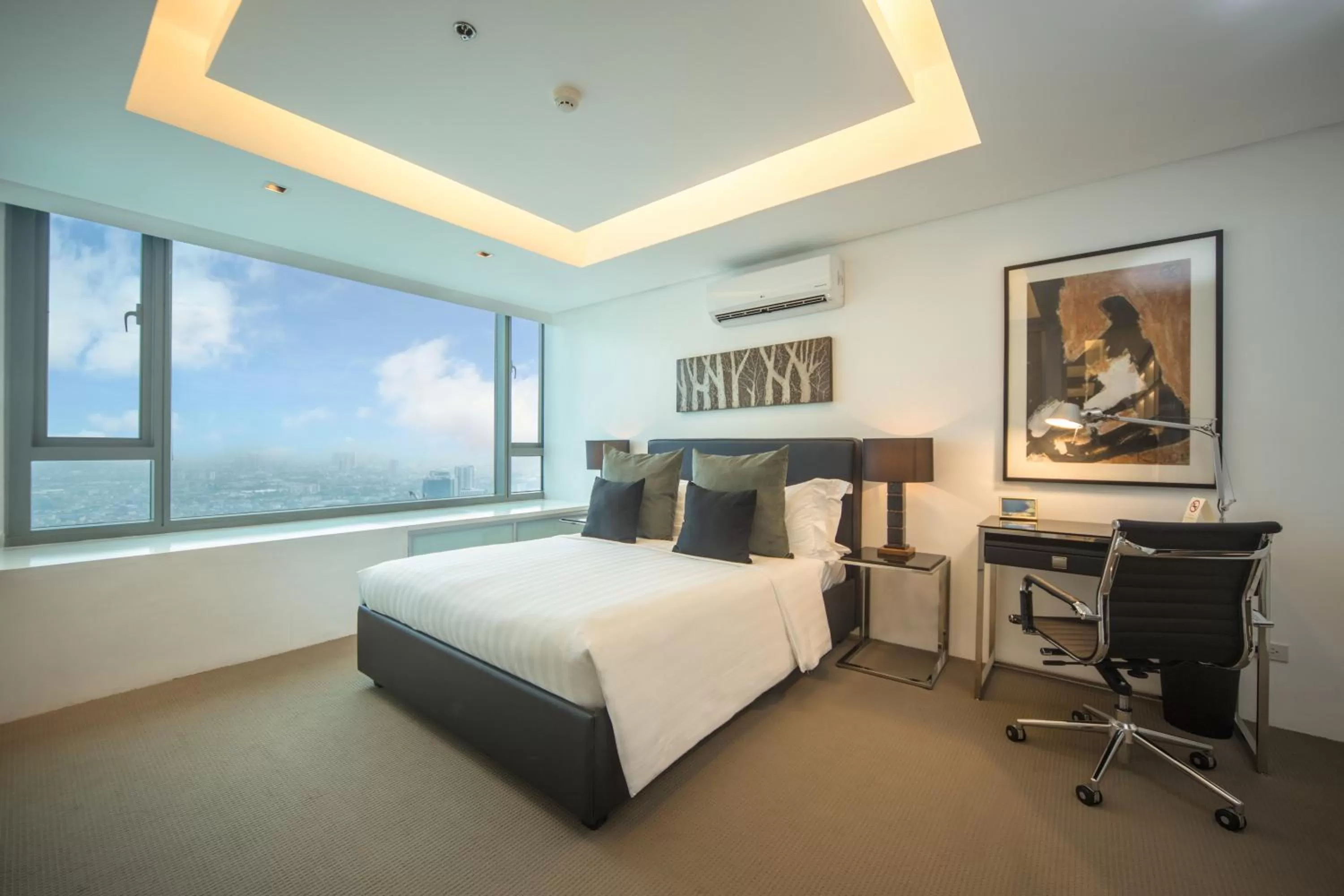 Bed in The Alpha Suites