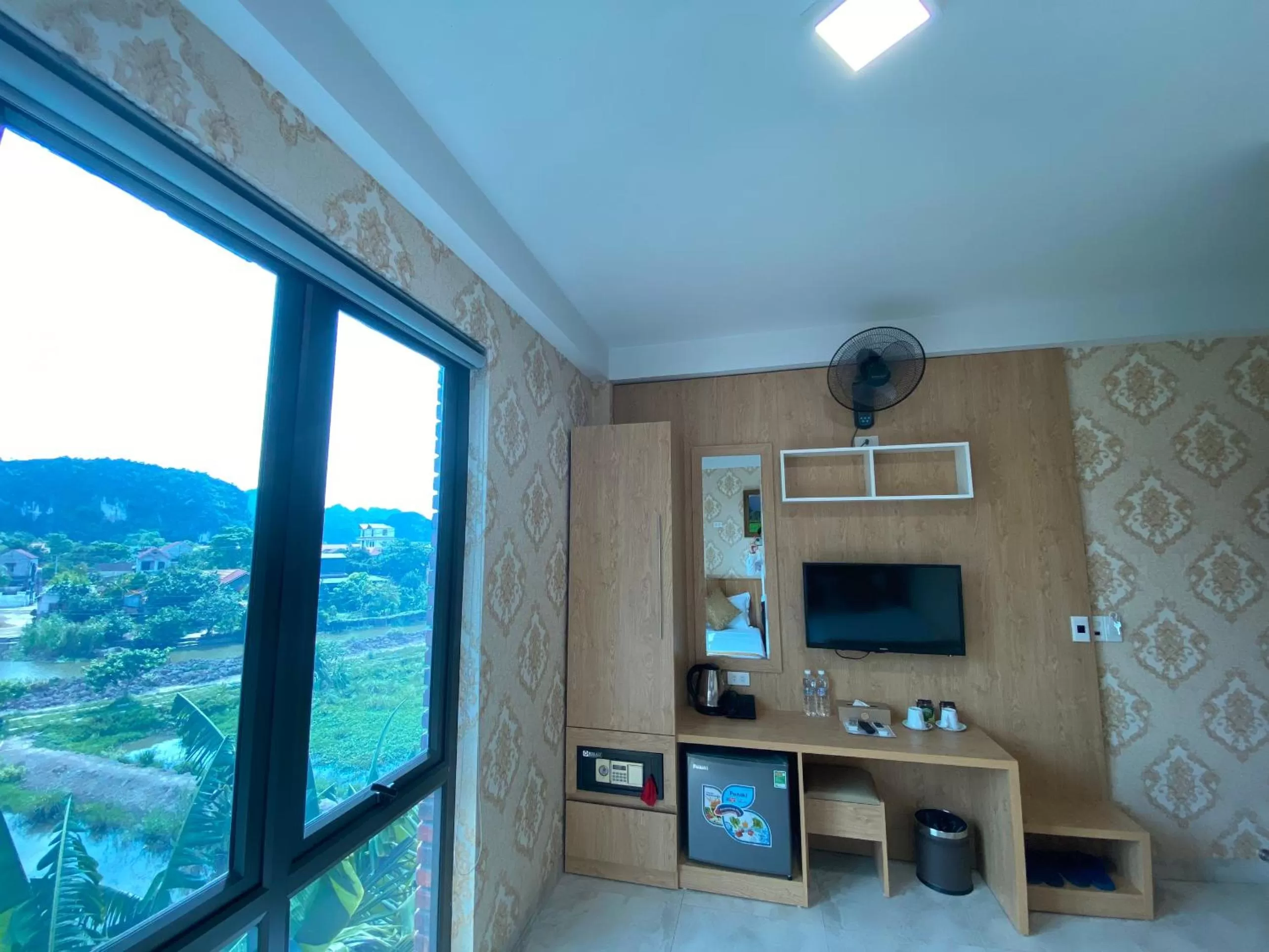 Bedroom in Cozynibi Hotel