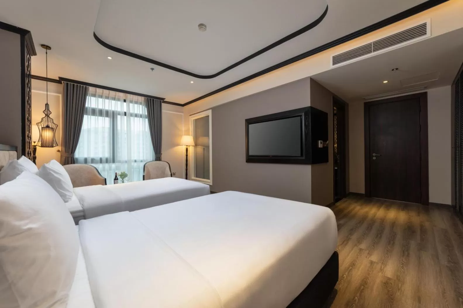 Communal lounge/ TV room, Bed in FTE Ba Dinh Hotel