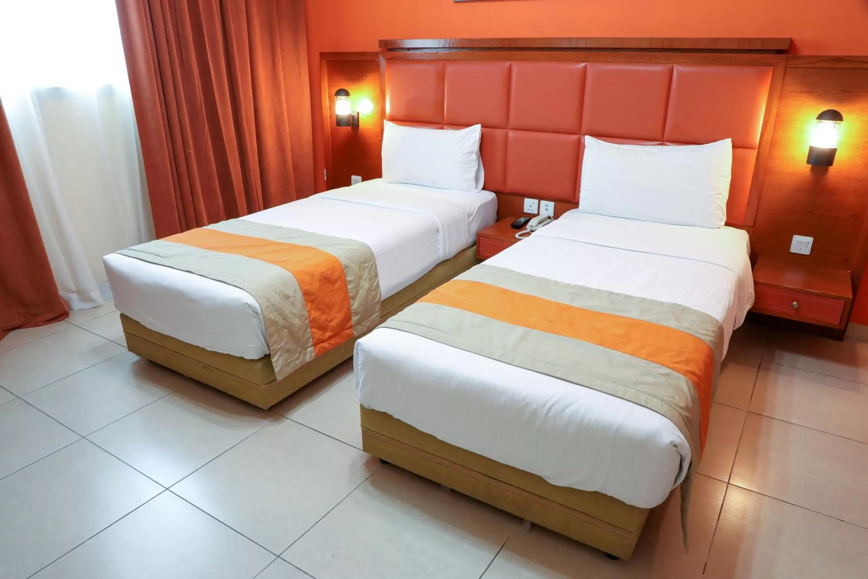 Bed in Wescott Plaza Hotel Apartments LLC Formerly West Zone Plaza Hotel Apts