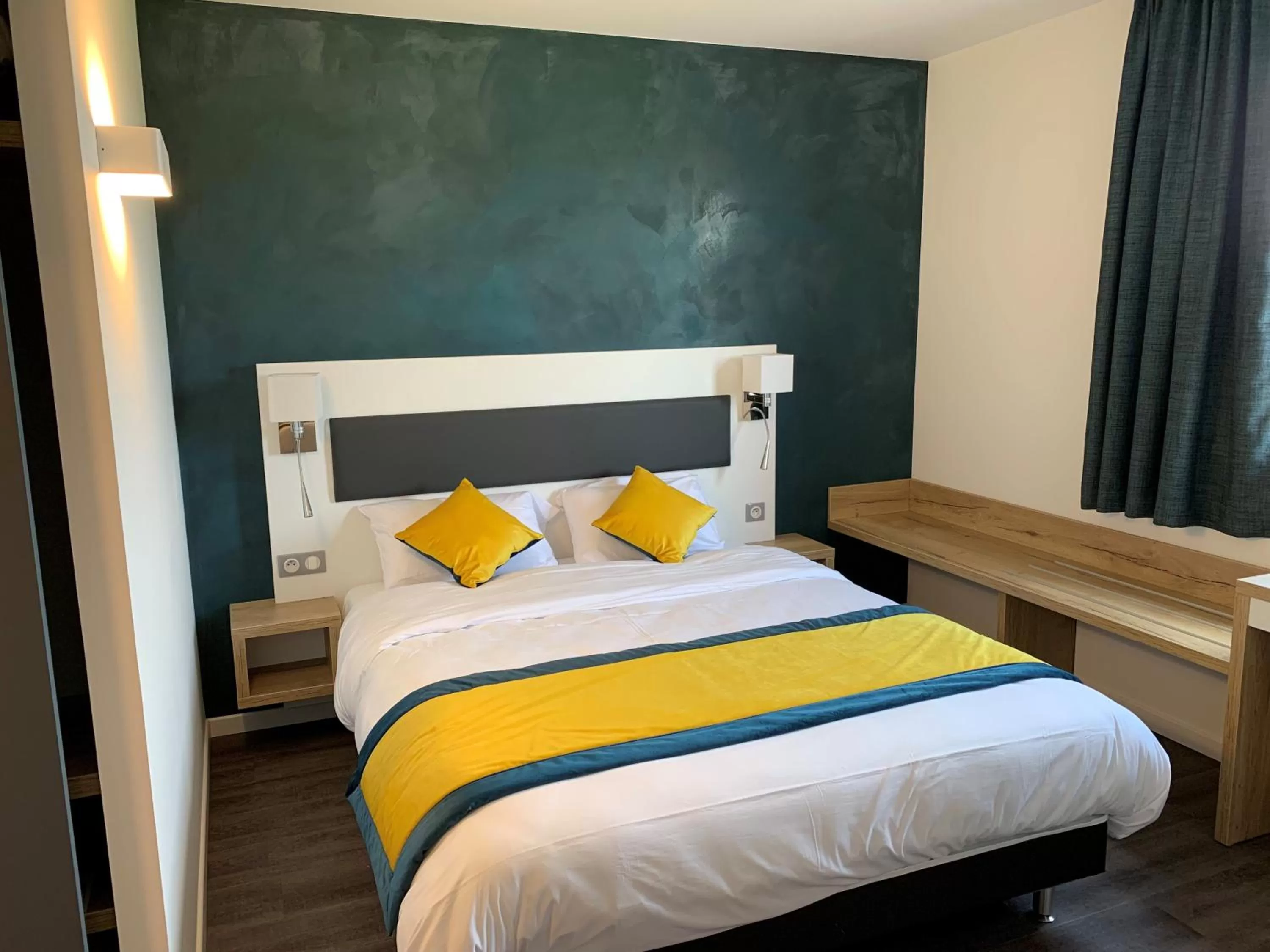 Bed in ATOLON PARK HOTEL