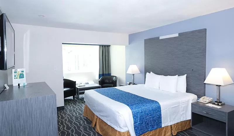 Bed in Travelodge Inn & Suites by Wyndham Anaheim on Disneyland Dr