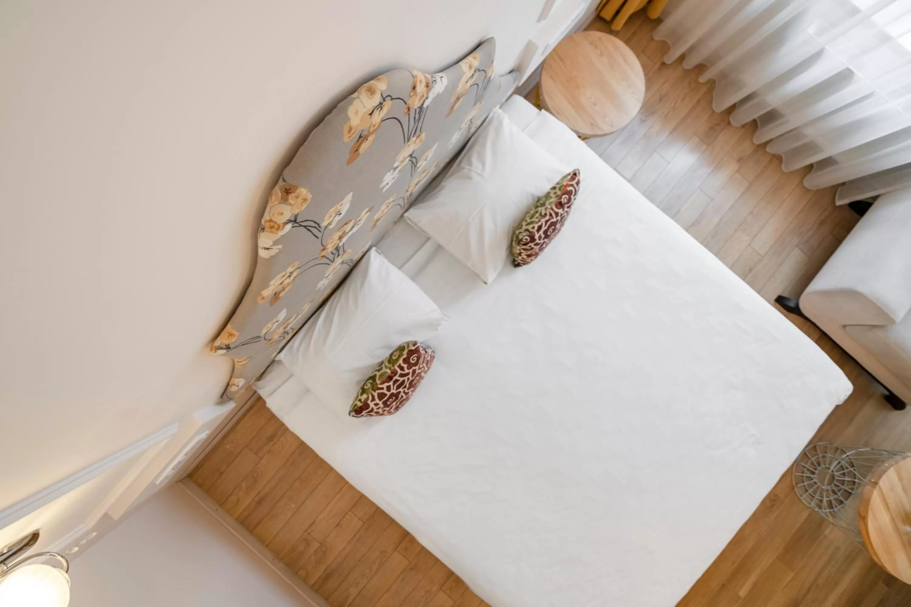 Bed in Vilnius Apartments