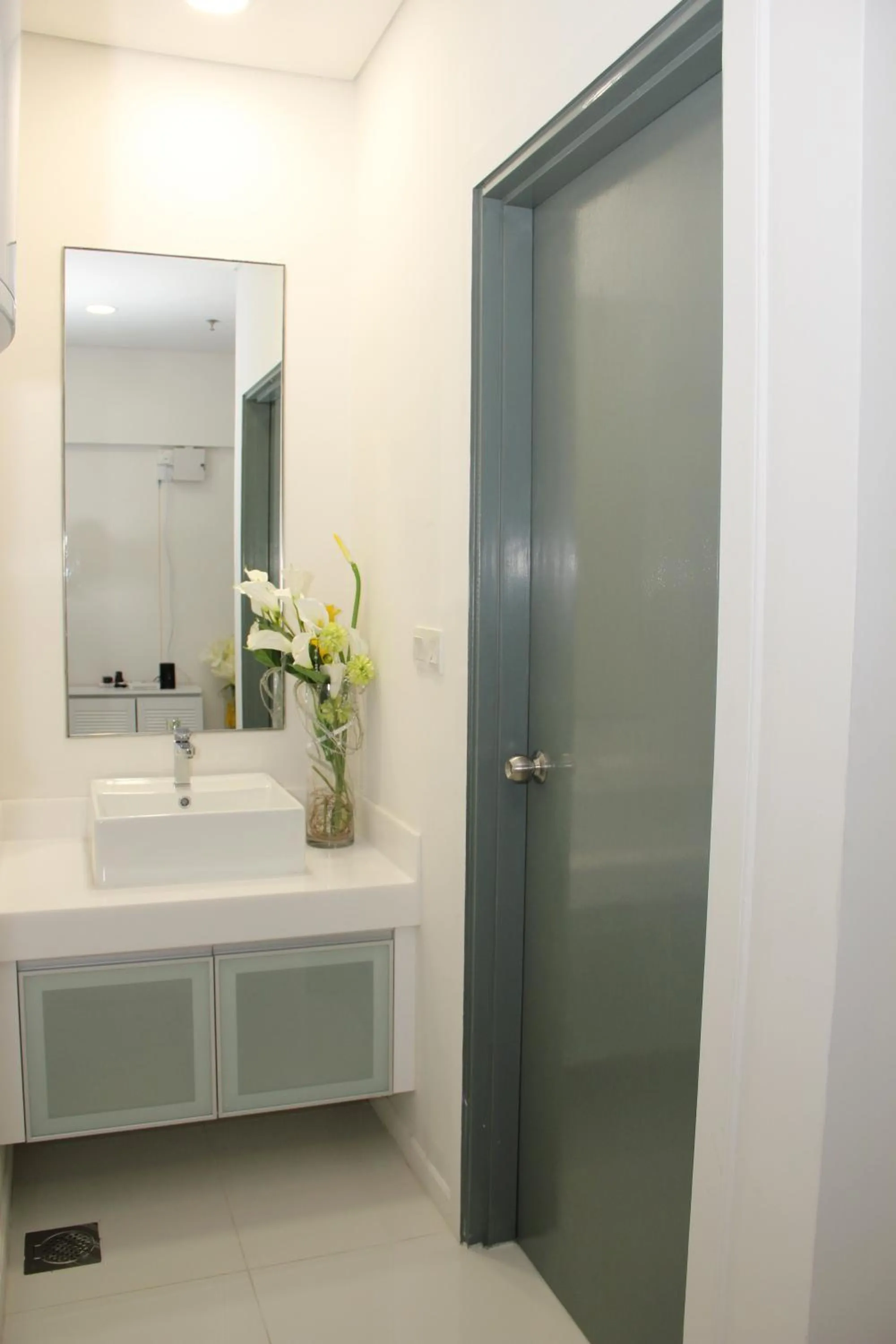 Bathroom in Summer Suites Residences by Subhome