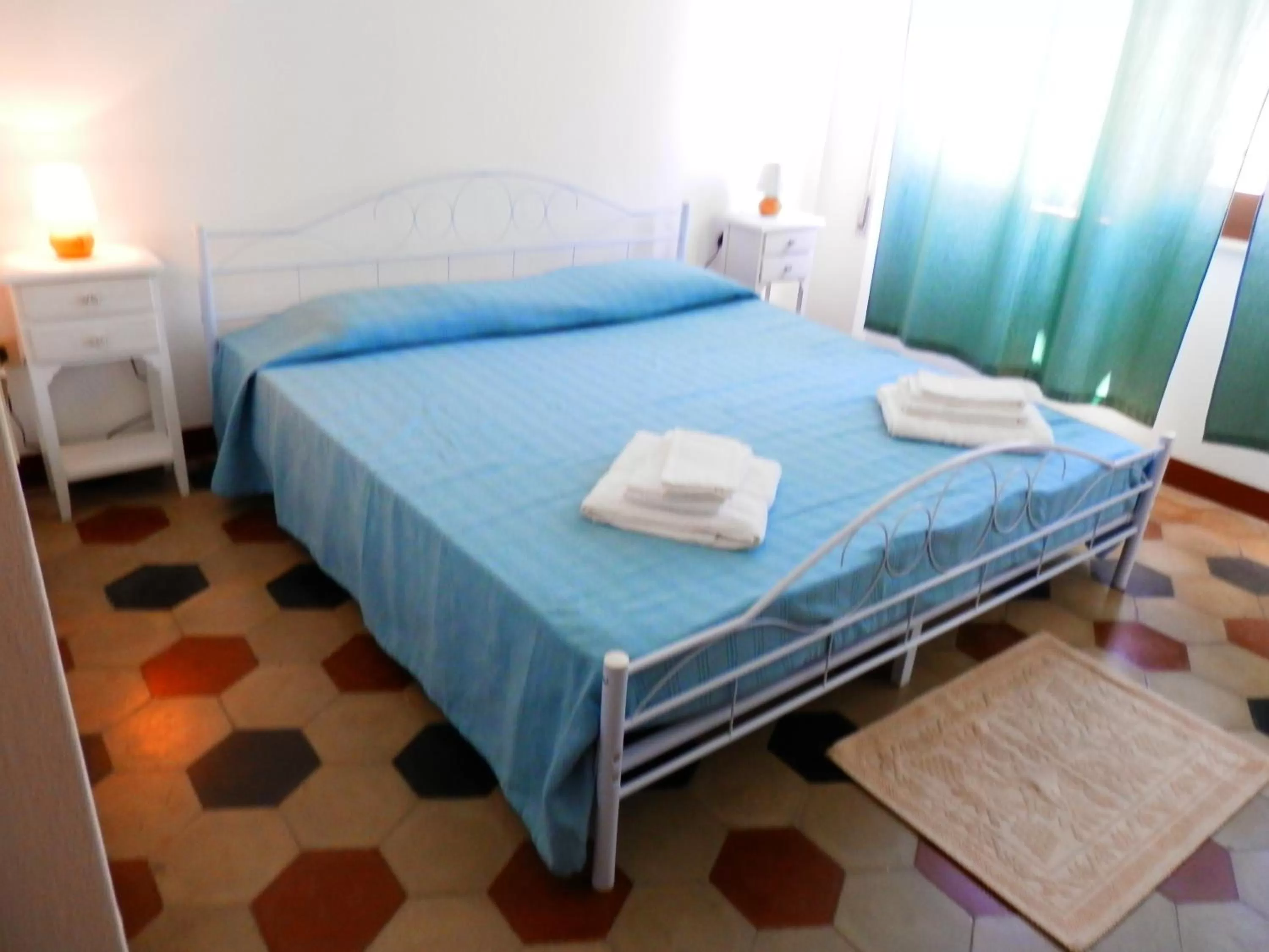 Decorative detail, Bed in S'Apprigu B&B