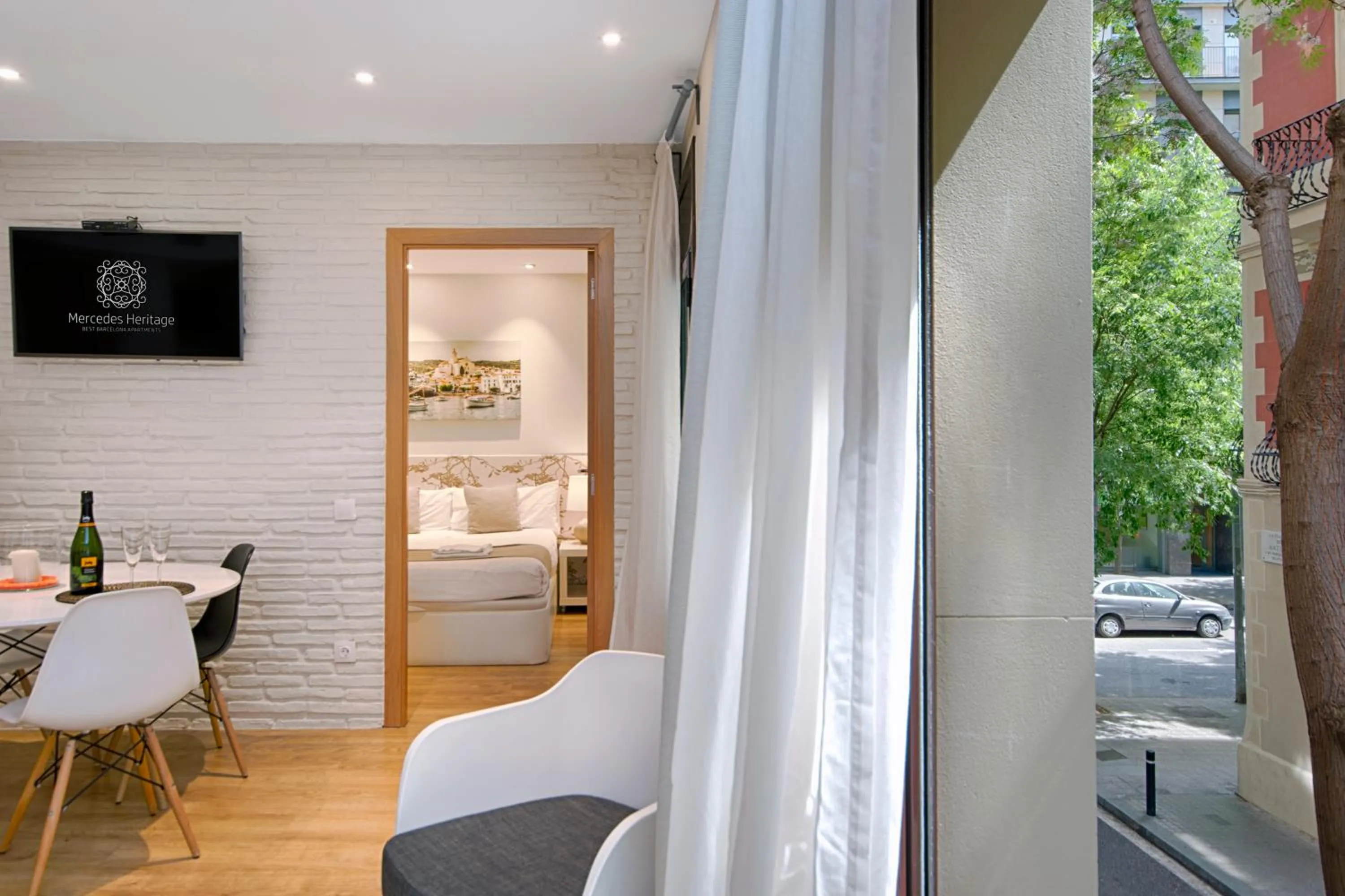 TV and multimedia in Eixample Building Apartments by Mercedes Heritage