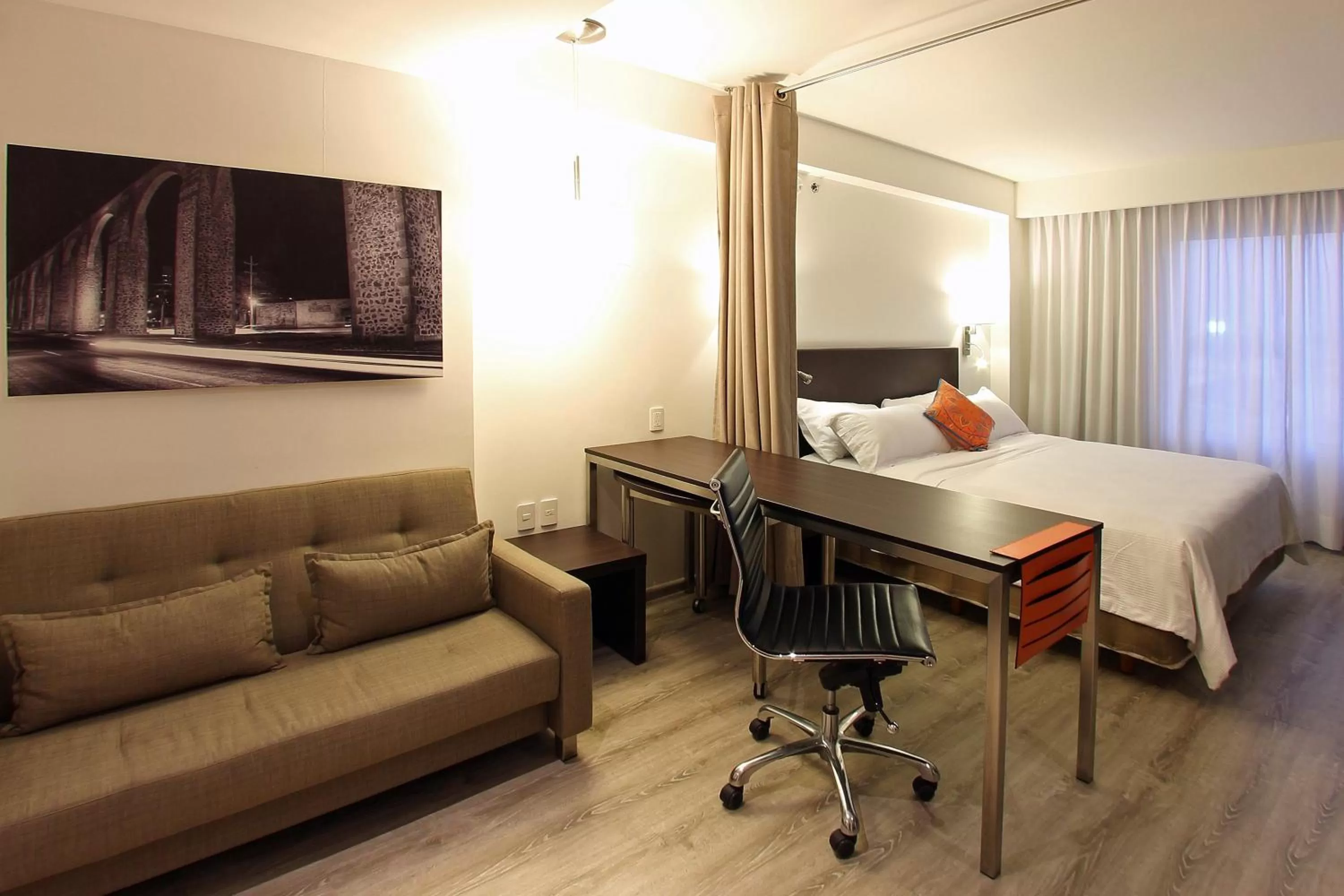 Photo of the whole room, Bed in Fiesta Inn Queretaro