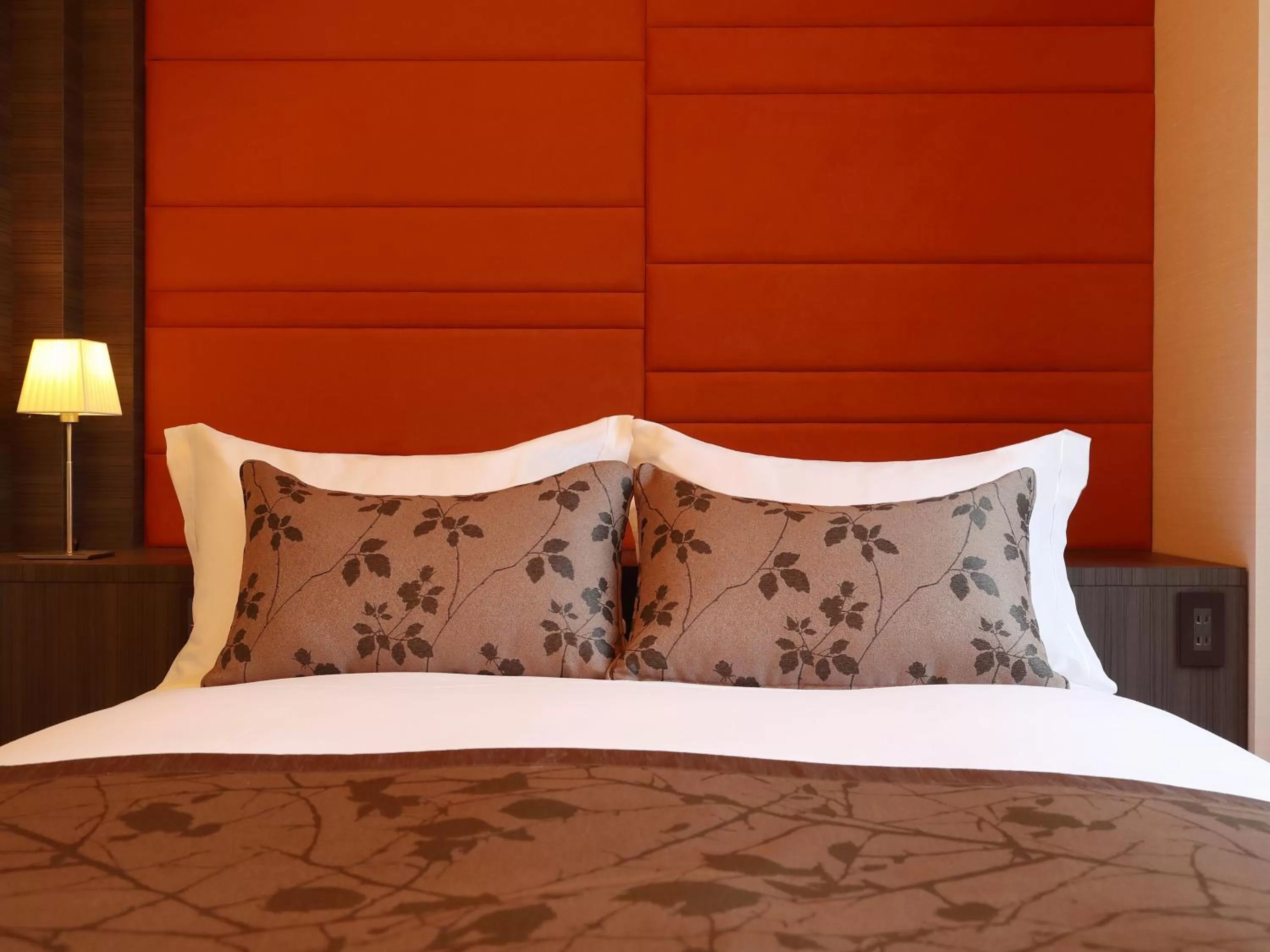 Bed in Hotel Sakura Suite Osaka Juso