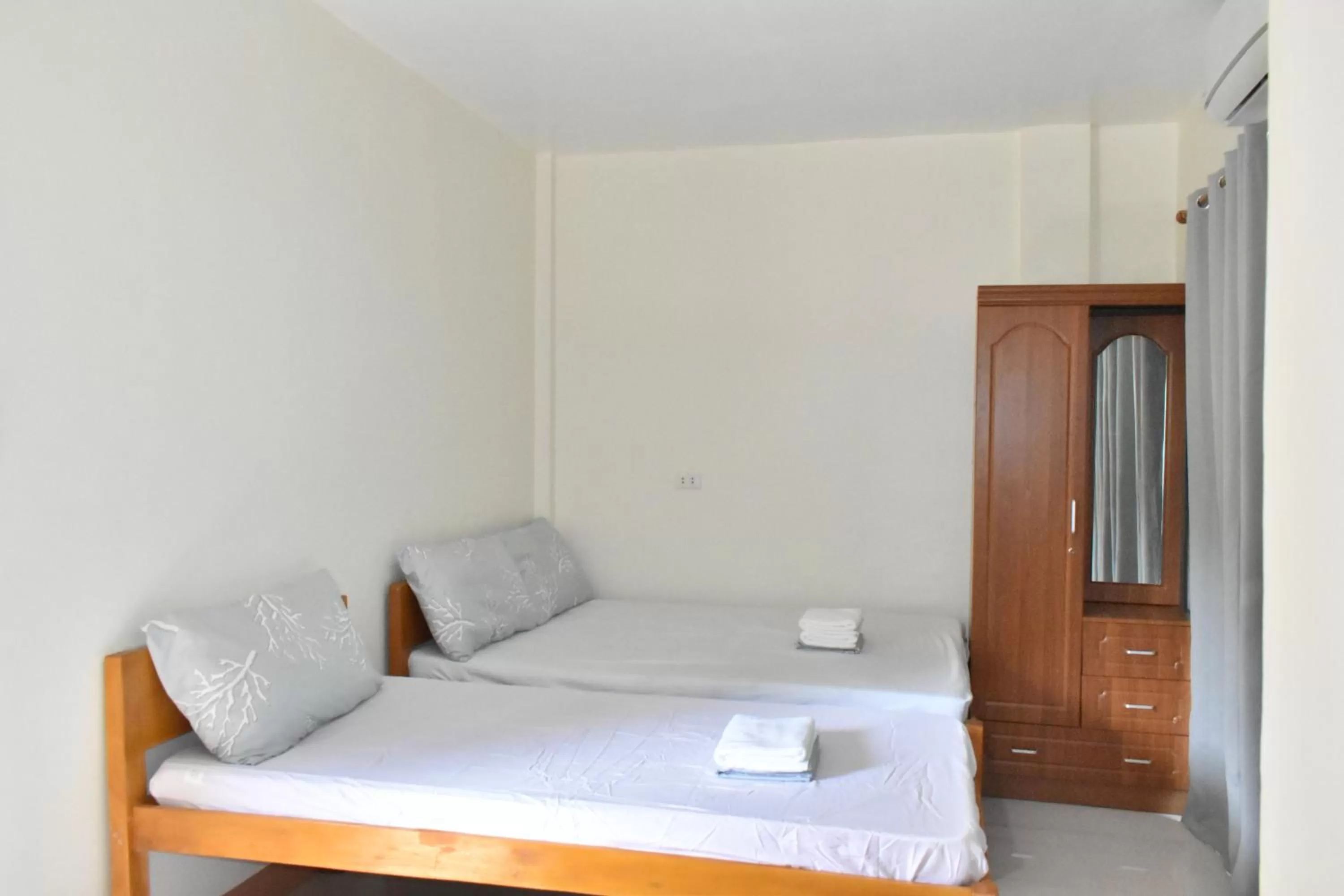 Bed in Charlina Inn Panglao