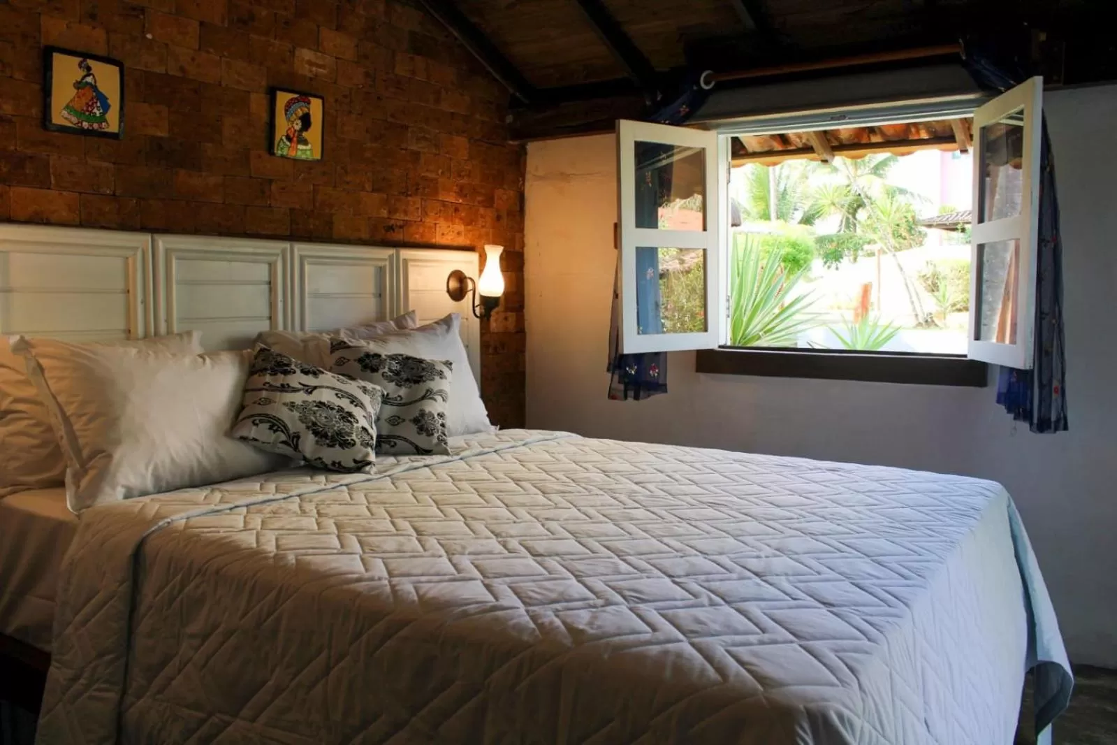 Bed in Pousada dos Hibiscus