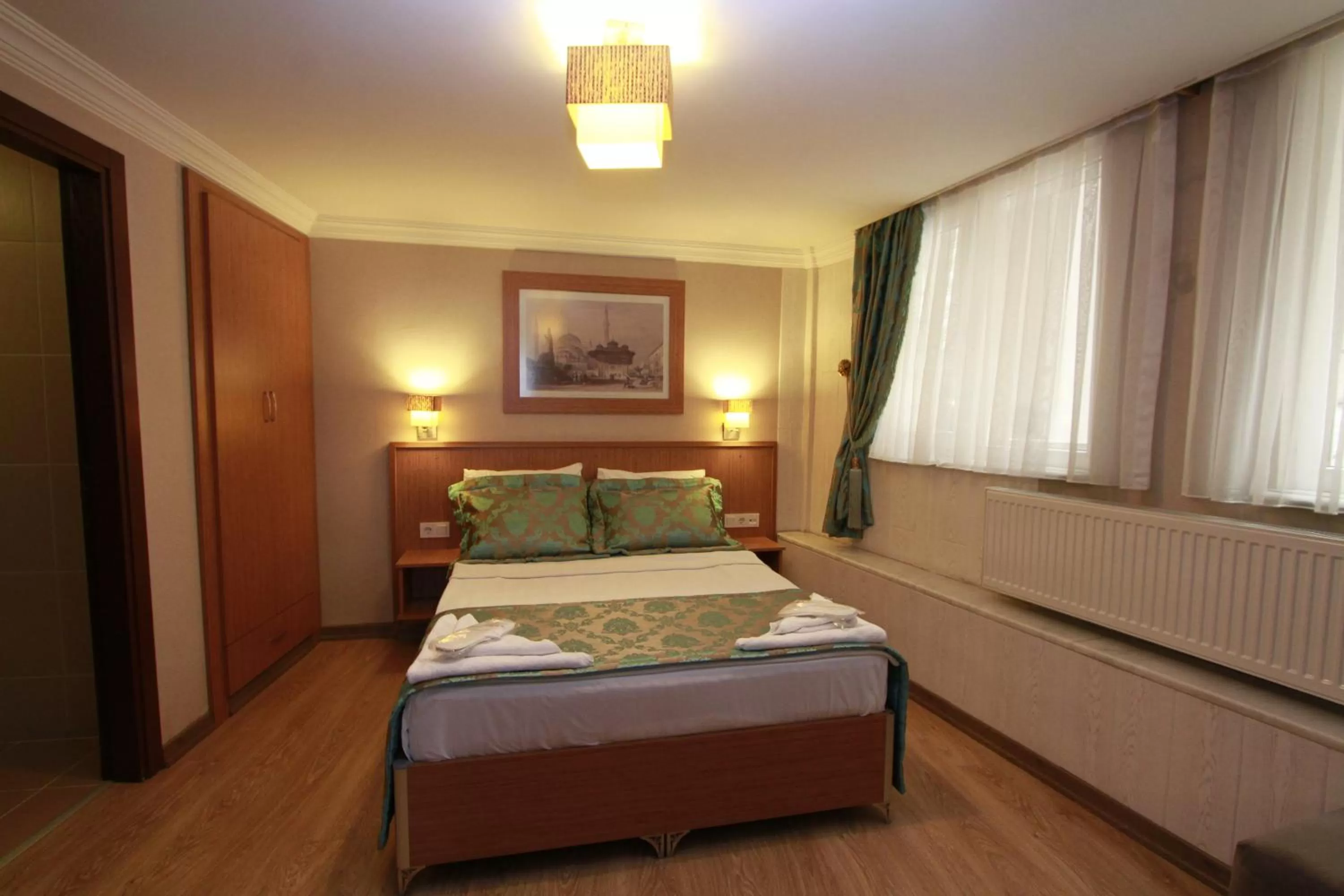 Bed in Agora Boutique Hotel & Bistro