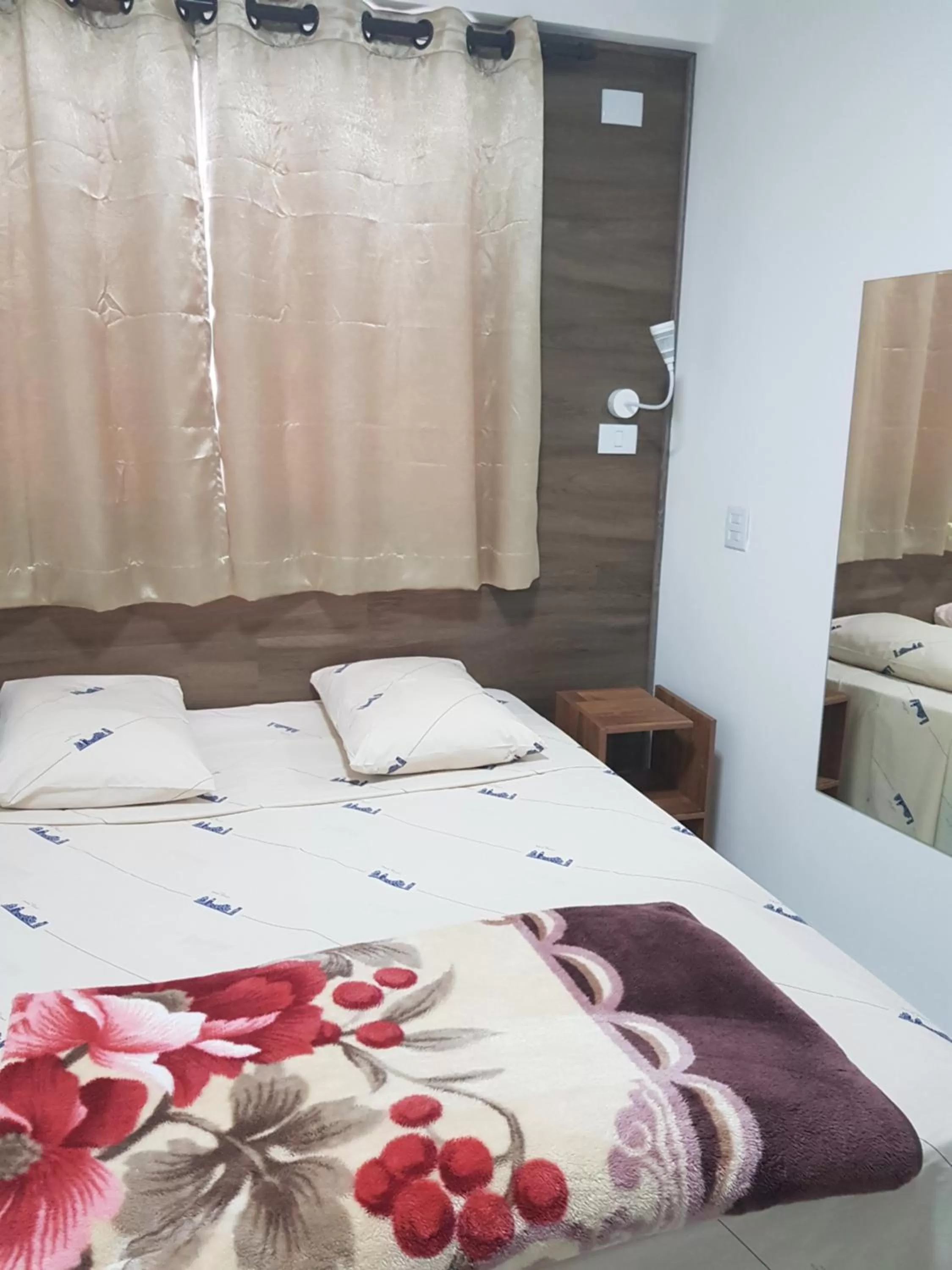 Bed in New Point Hotel