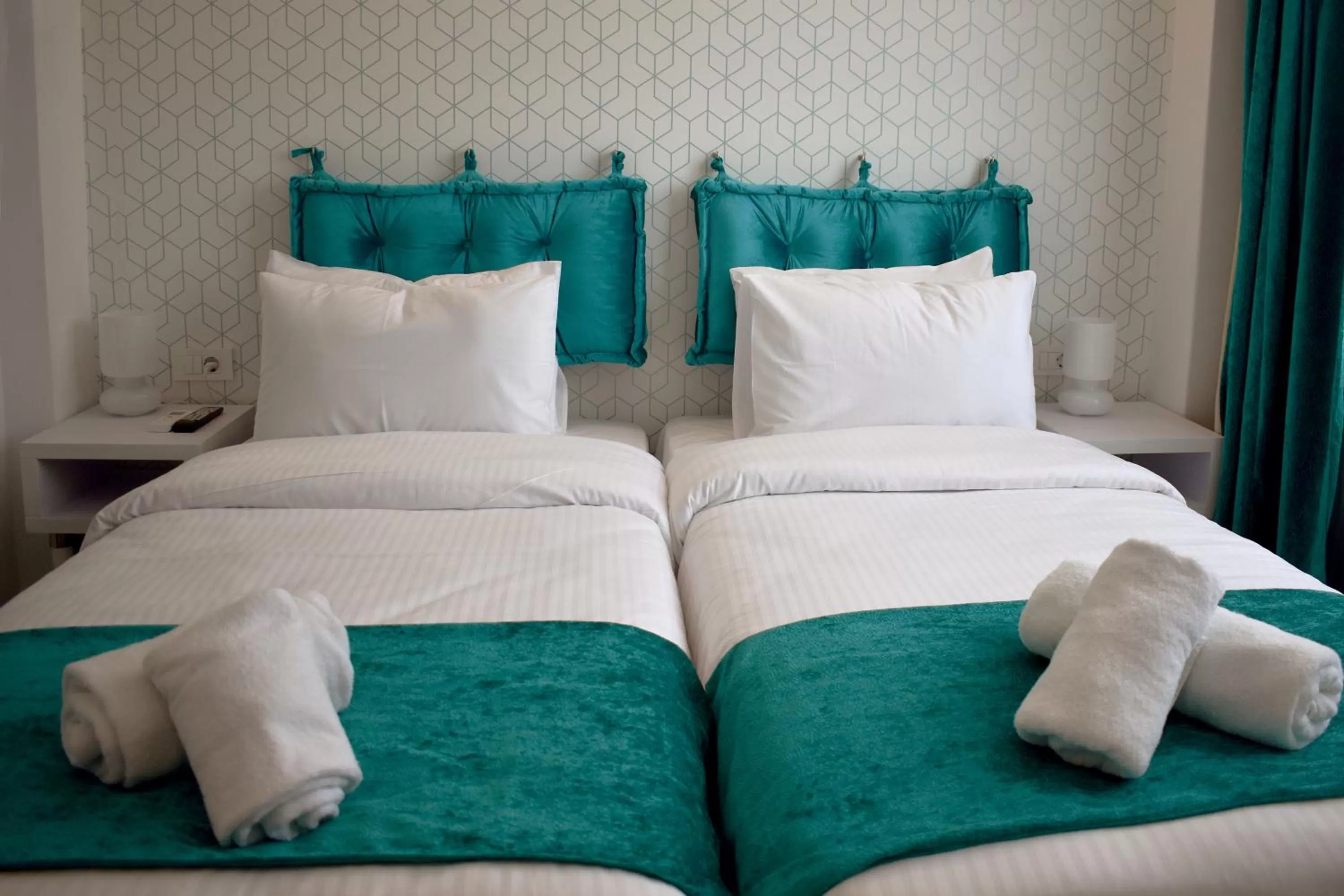 Bed in Athenian Montaza Hotel