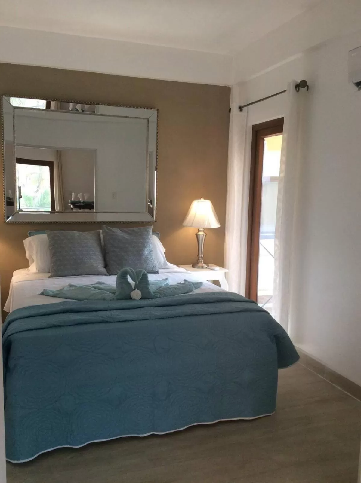 Bed in Beach Side Condos Caye Caulker by CCVH