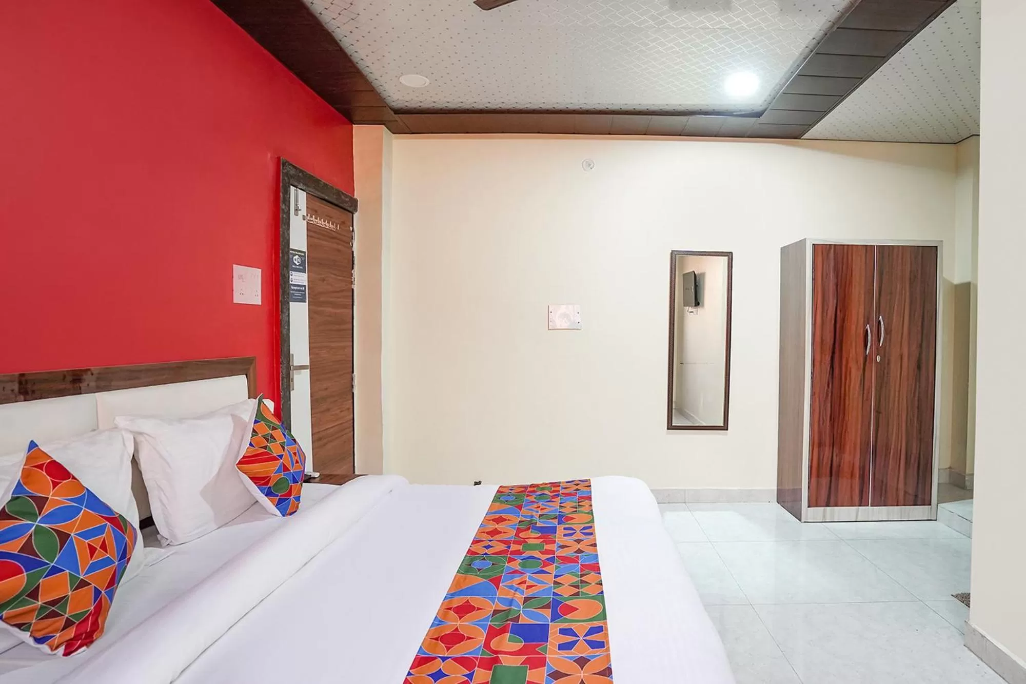 Bed in FabHotel Rajdhani