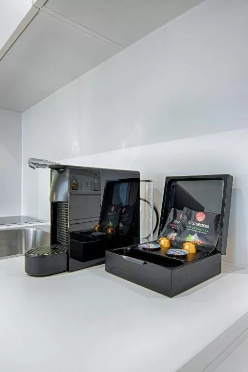 Kitchen or kitchenette in Motel by Maier Götzis- kontaktloser Check-in