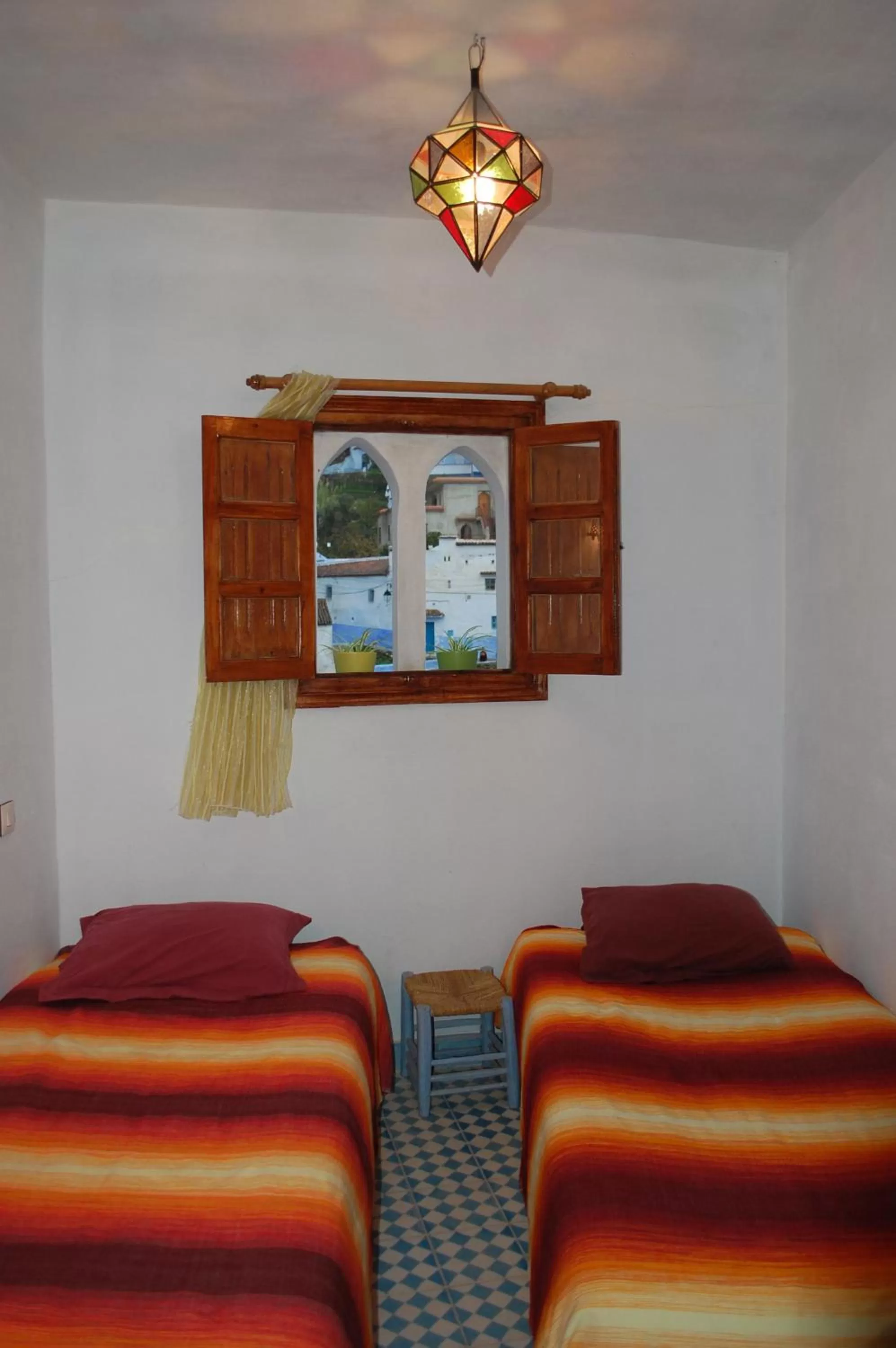 Bed, Seating Area in Dar Dalia