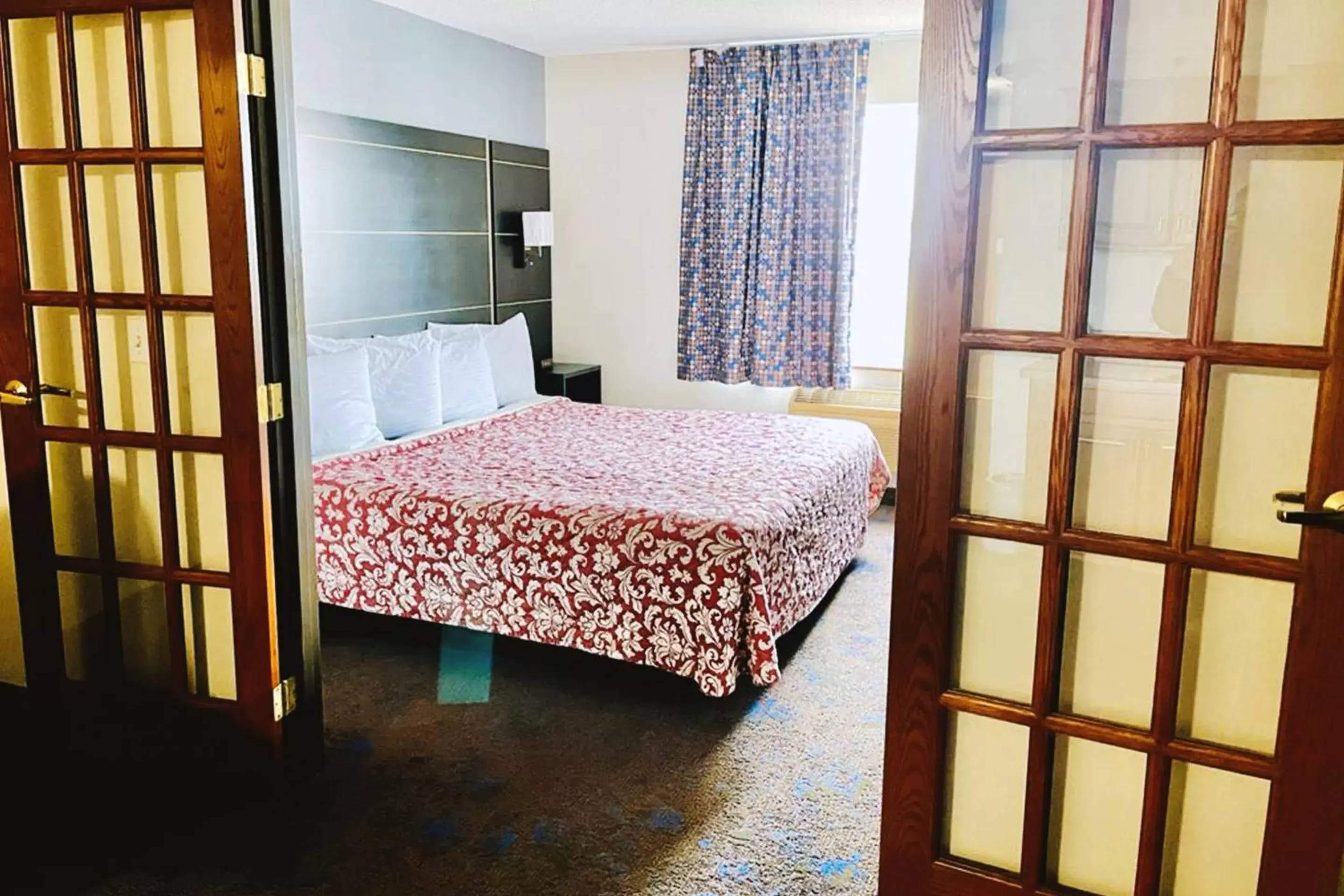 King Suite Non-Smoking in Coratel Inn & Suites by Jasper Northfield King Suite Non-Smoking in Coratel Inn & Suites by Jasper Northfield