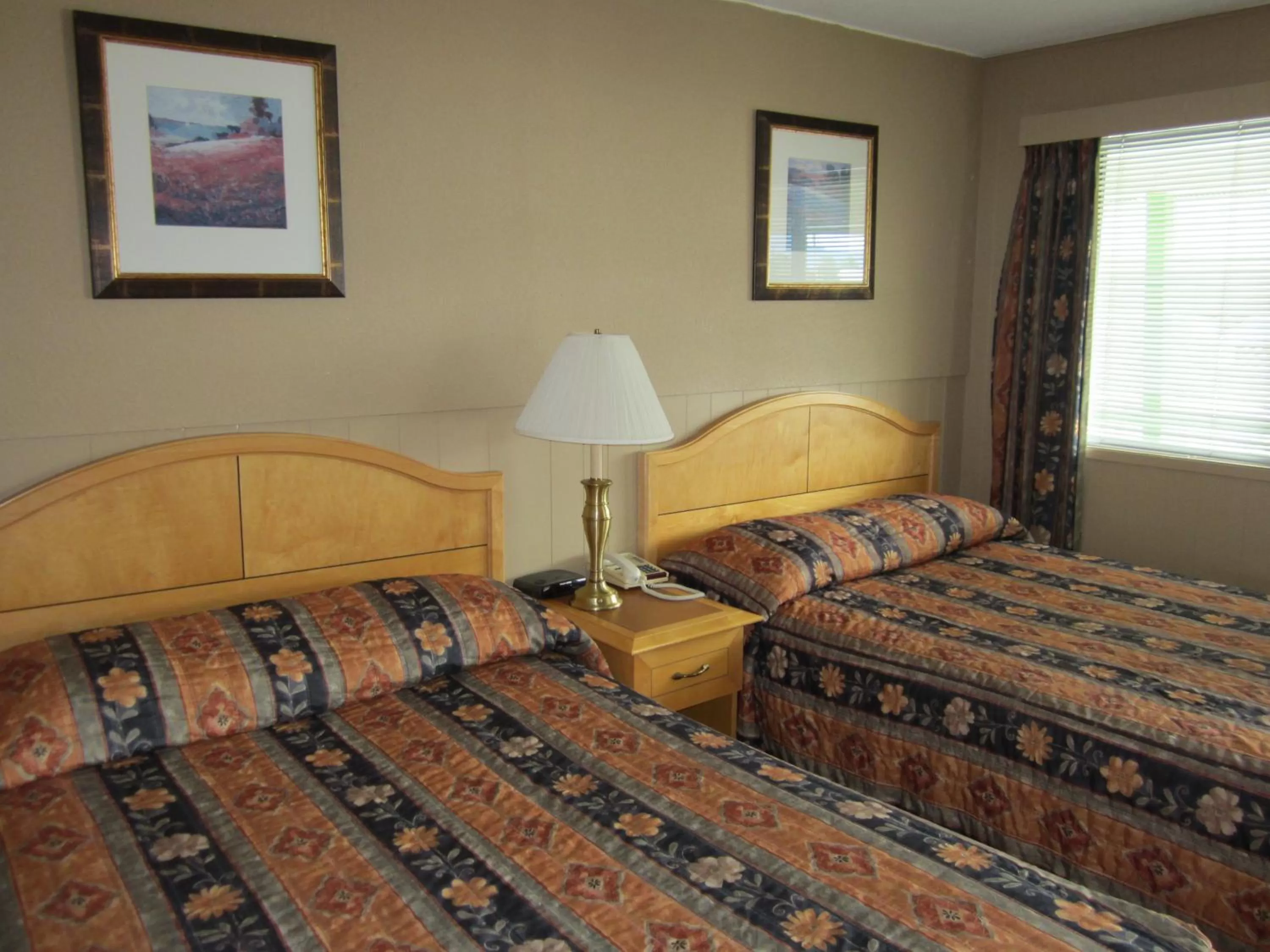 Bed in Bulkley Valley Motel