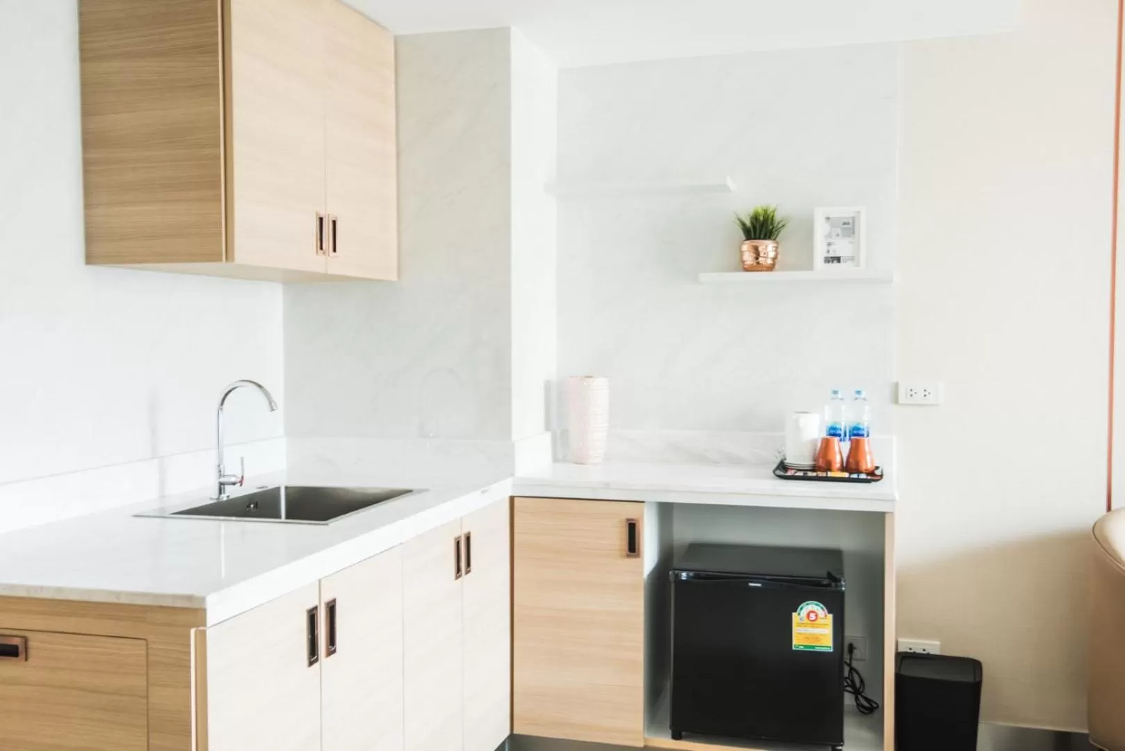 Kitchen or kitchenette in twothree a homely hotel - SHA Extra Plus