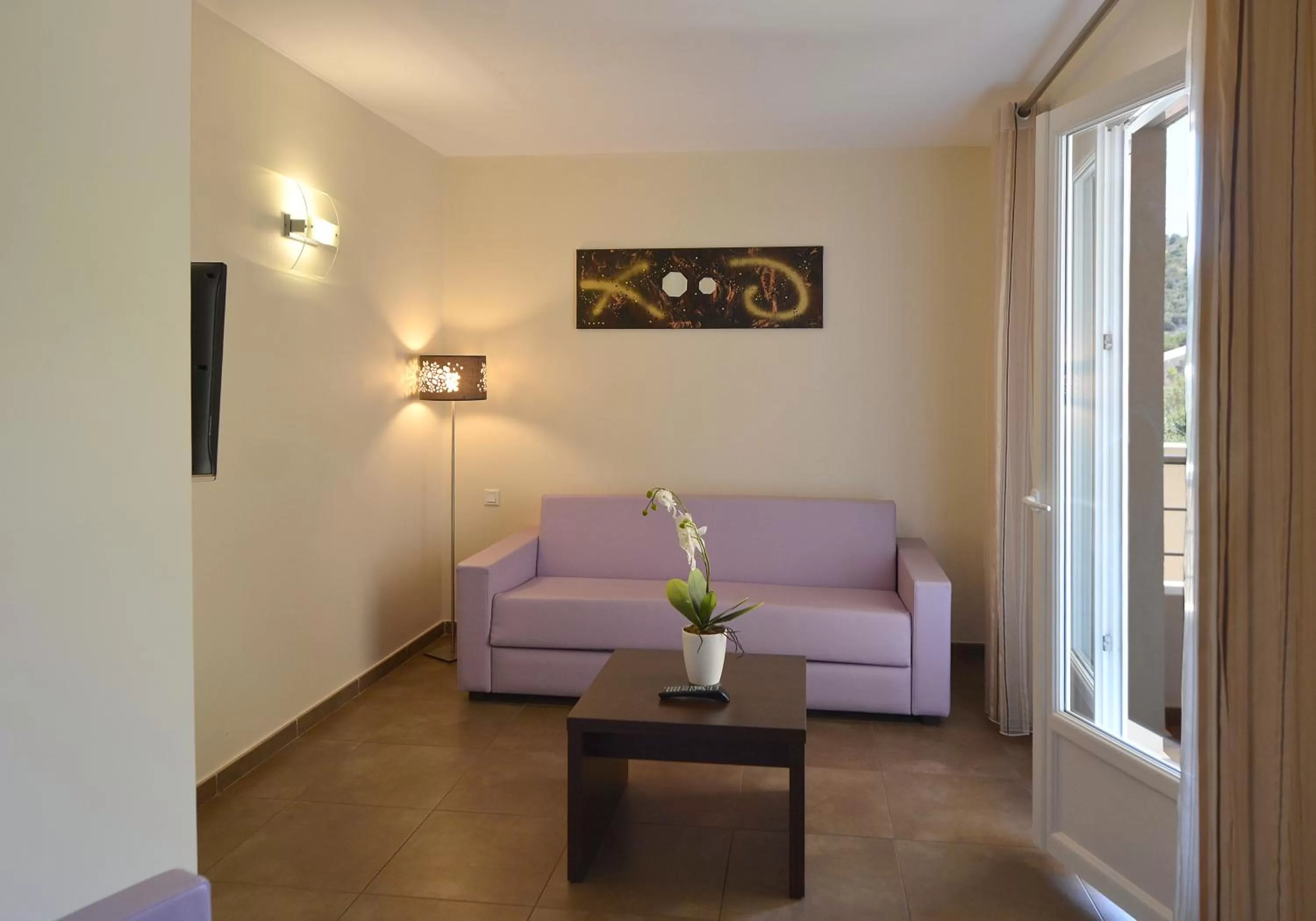 Seating area in Hôtel A Madonetta