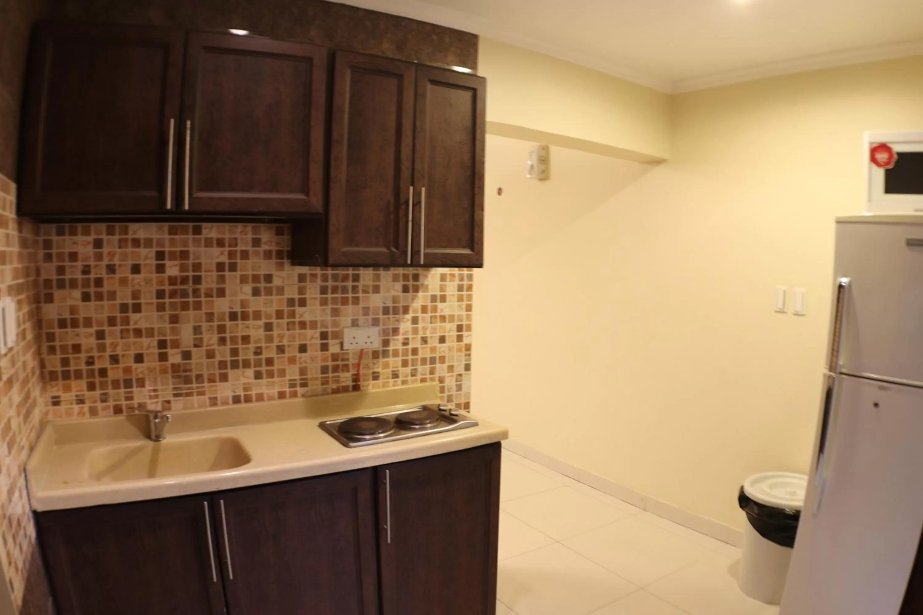 Kitchen or kitchenette in Maskan Al Dyafah Hotel Apartments