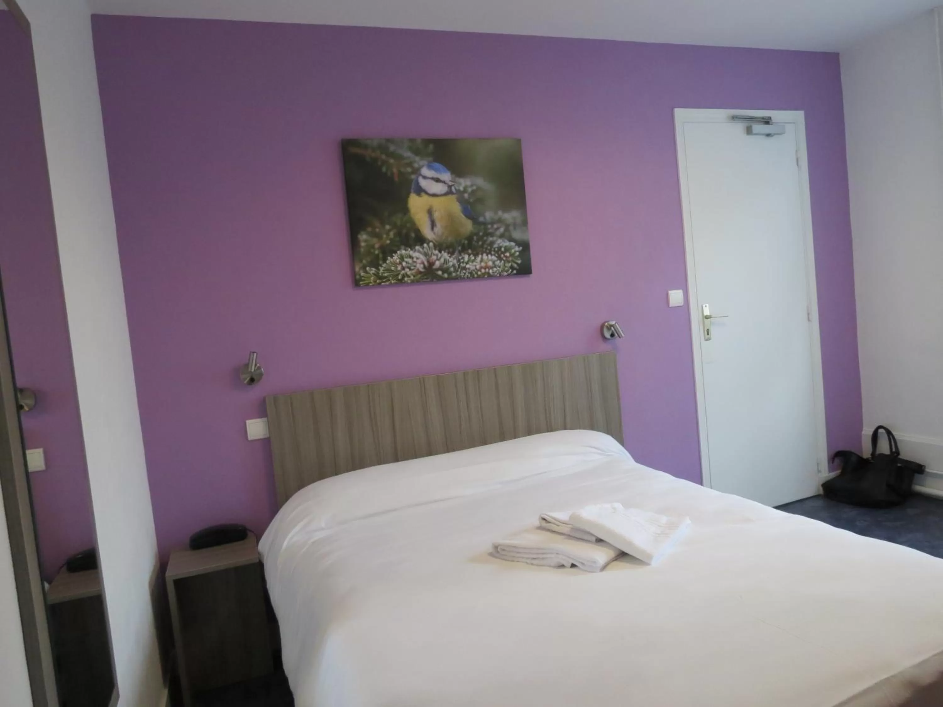 Bed in Hotel le Faisan