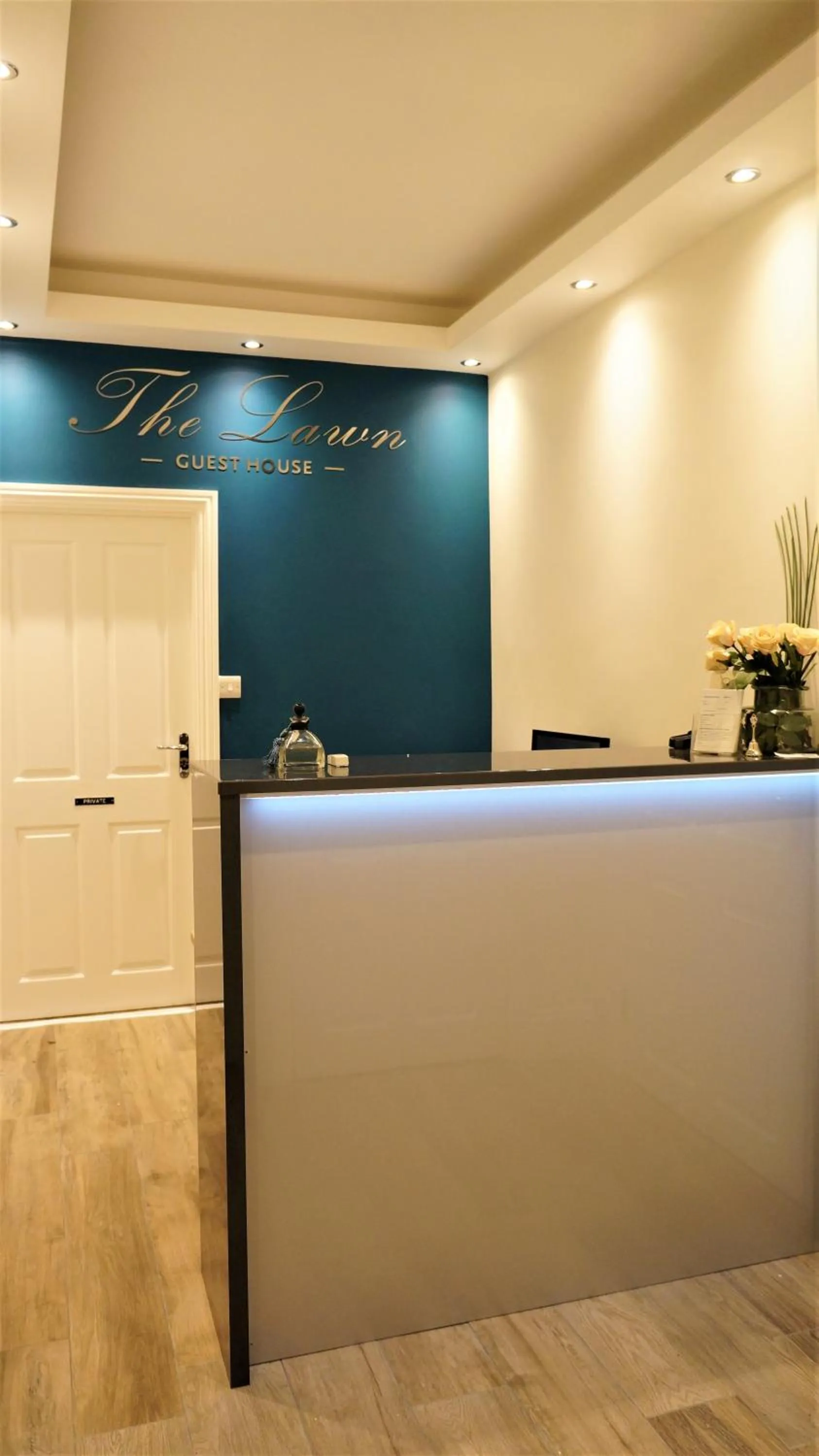 Property logo or sign in The Lawn Guest House Gatwick