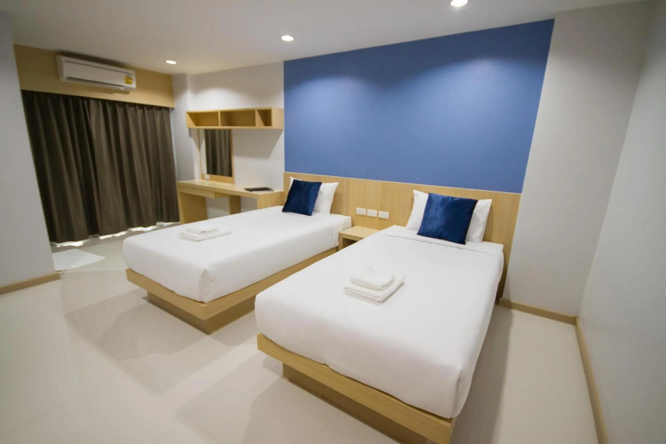 Bed in Charisma Residence