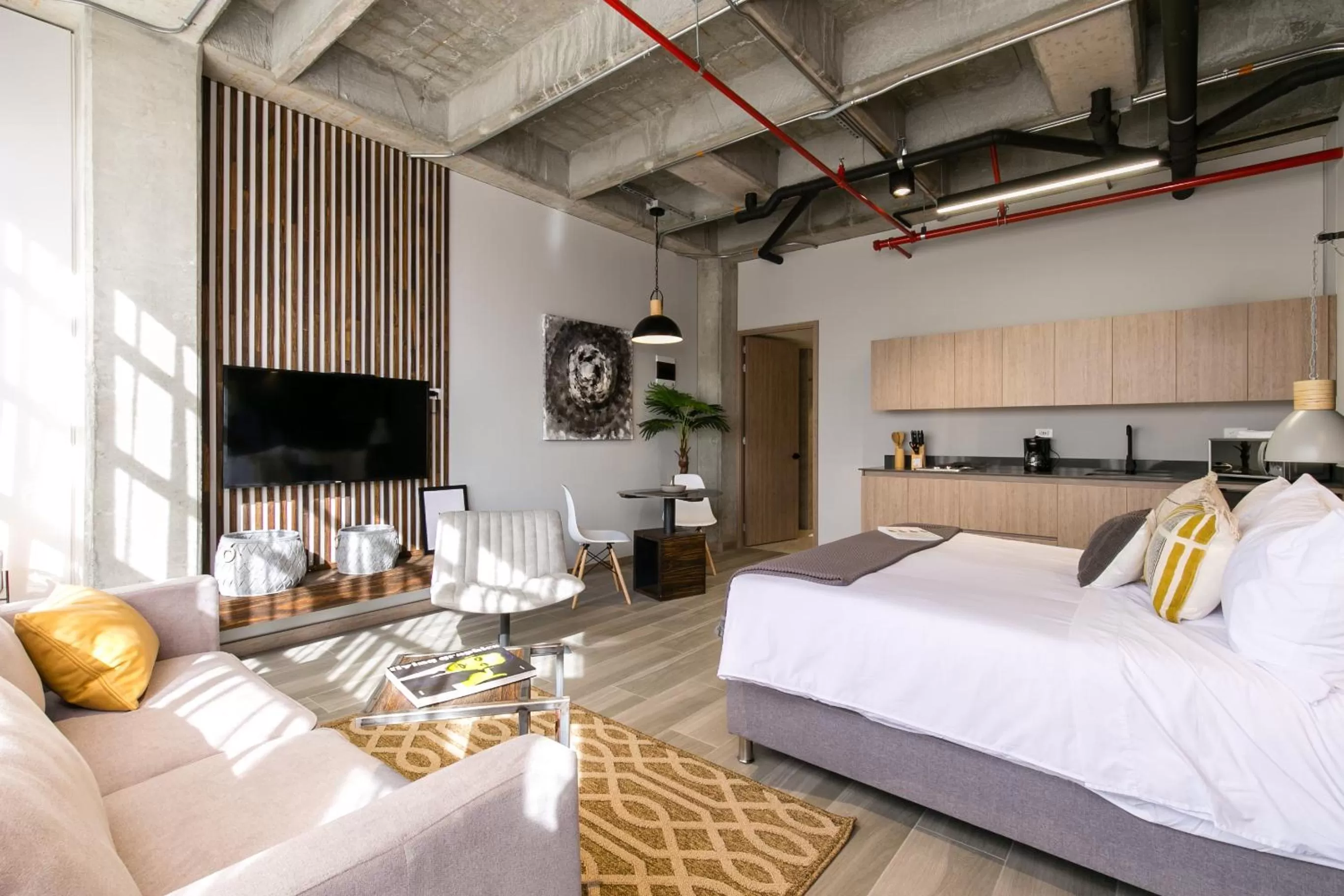 Bed in Factory Lofts Hotel