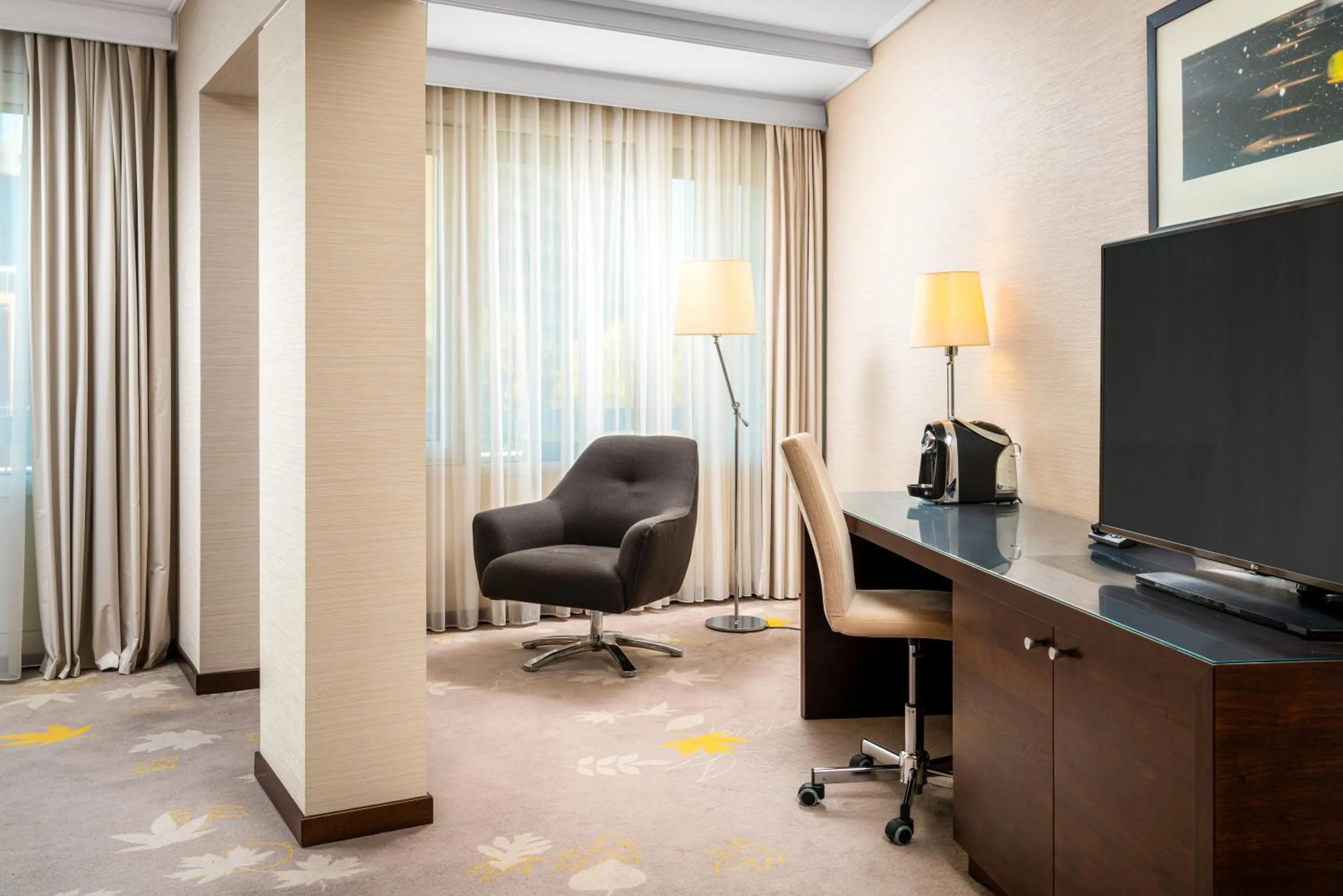 Seating area in Crowne Plaza Bucharest by IHG