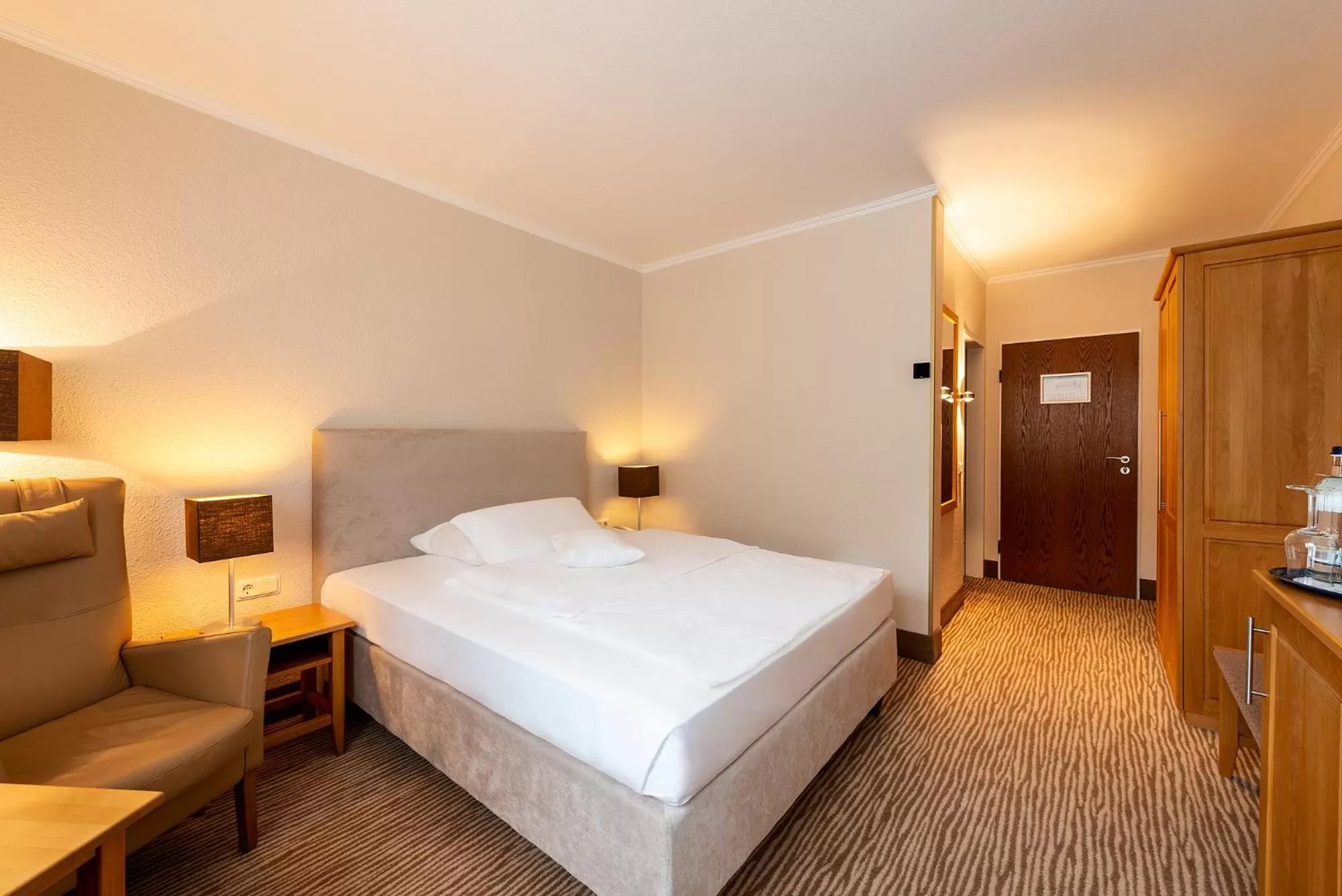 Bed in MUNTE - Wellnesshotel am Stadtwald