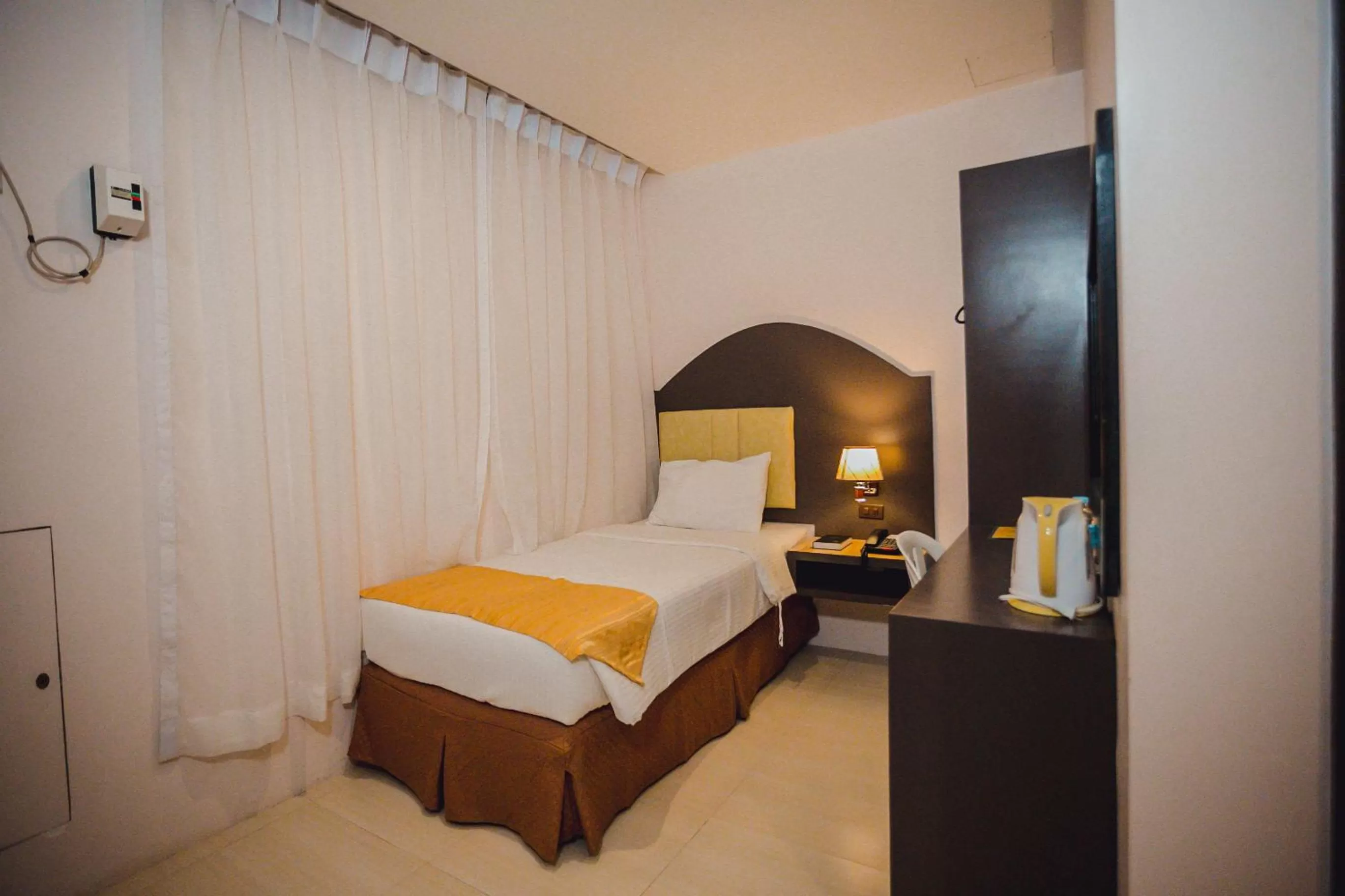 Bed in Butuan Grand Palace Hotel