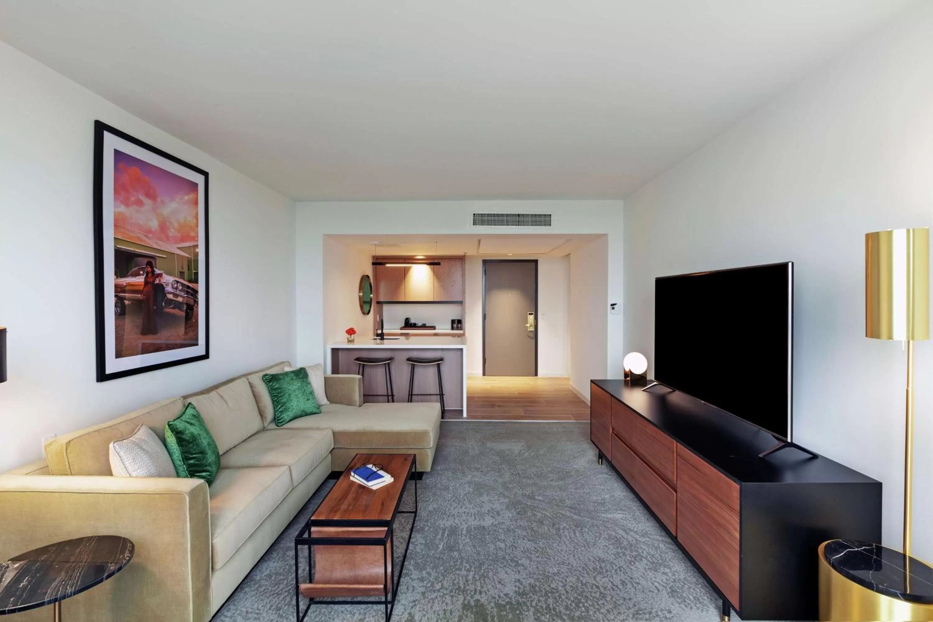 Living room in C. Baldwin, Curio Collection by Hilton