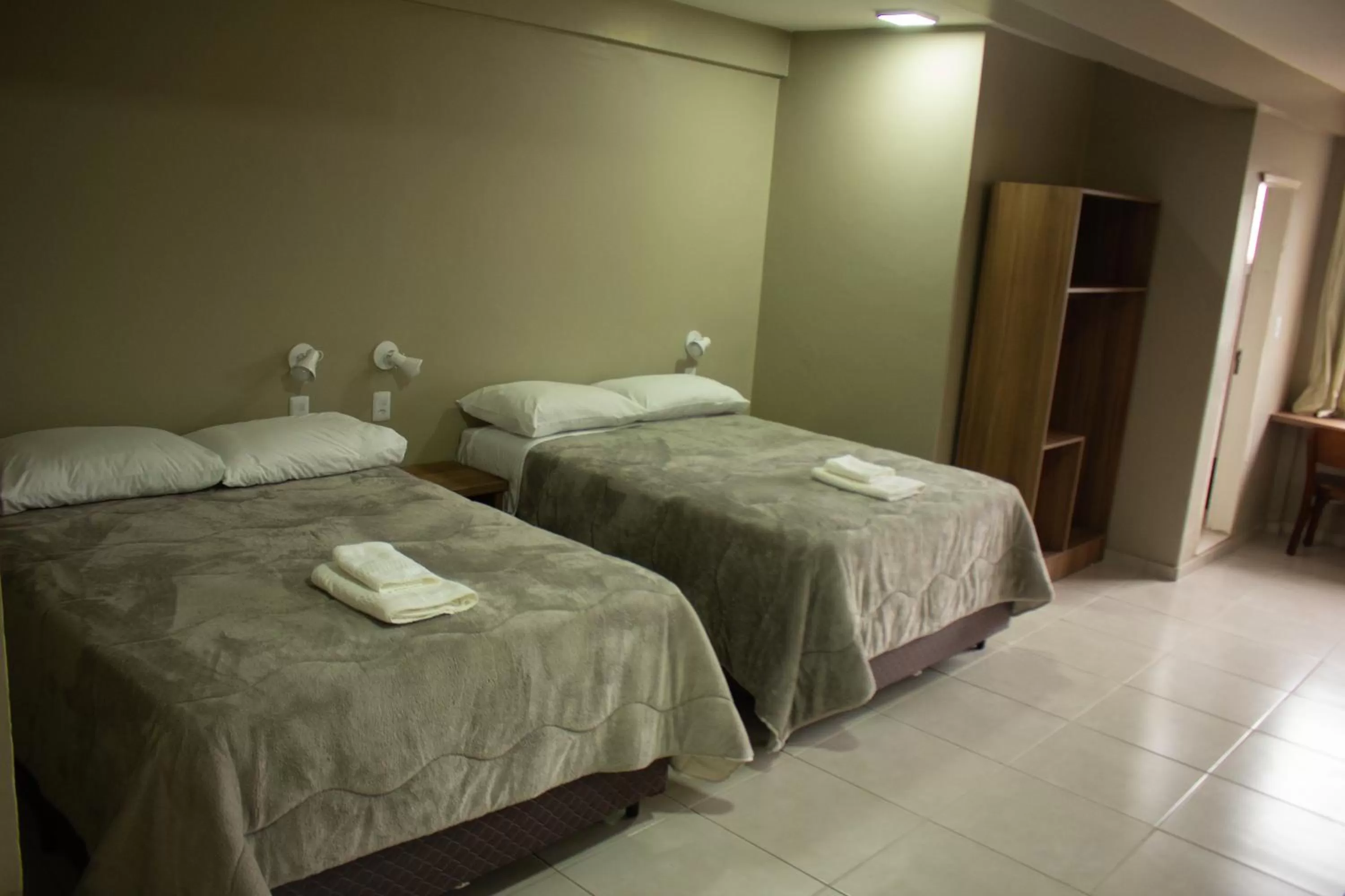 Bed in Hotel Executivo